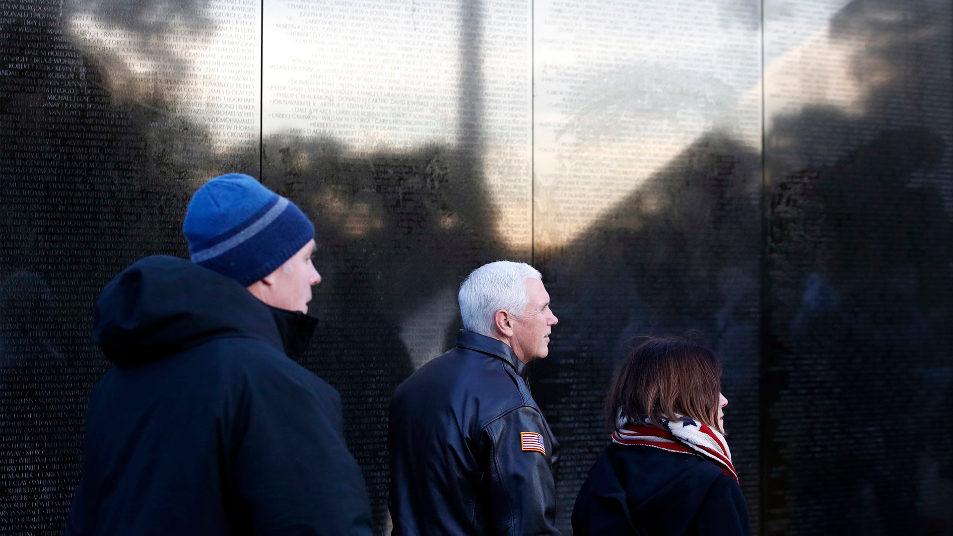 Interior Secretary Ryan Zinke VP Mike Pence, and his wife Karen at the Vietnam Veterans Memorial on Veterans Day
