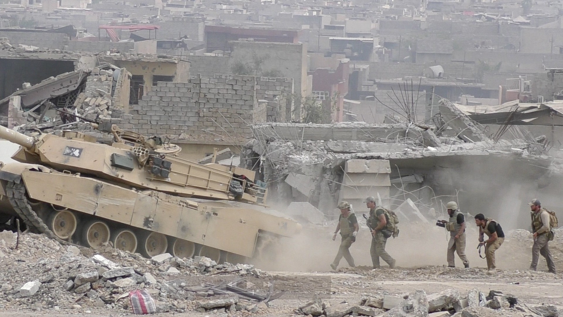 While under fire, the team follows a single Iraqi tank toward ISIS lines to rescue stranded civilians, June 2, 2017