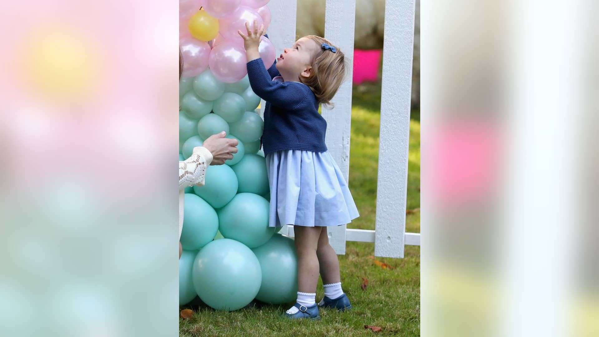Princess Charlotte discovers even more balloons.