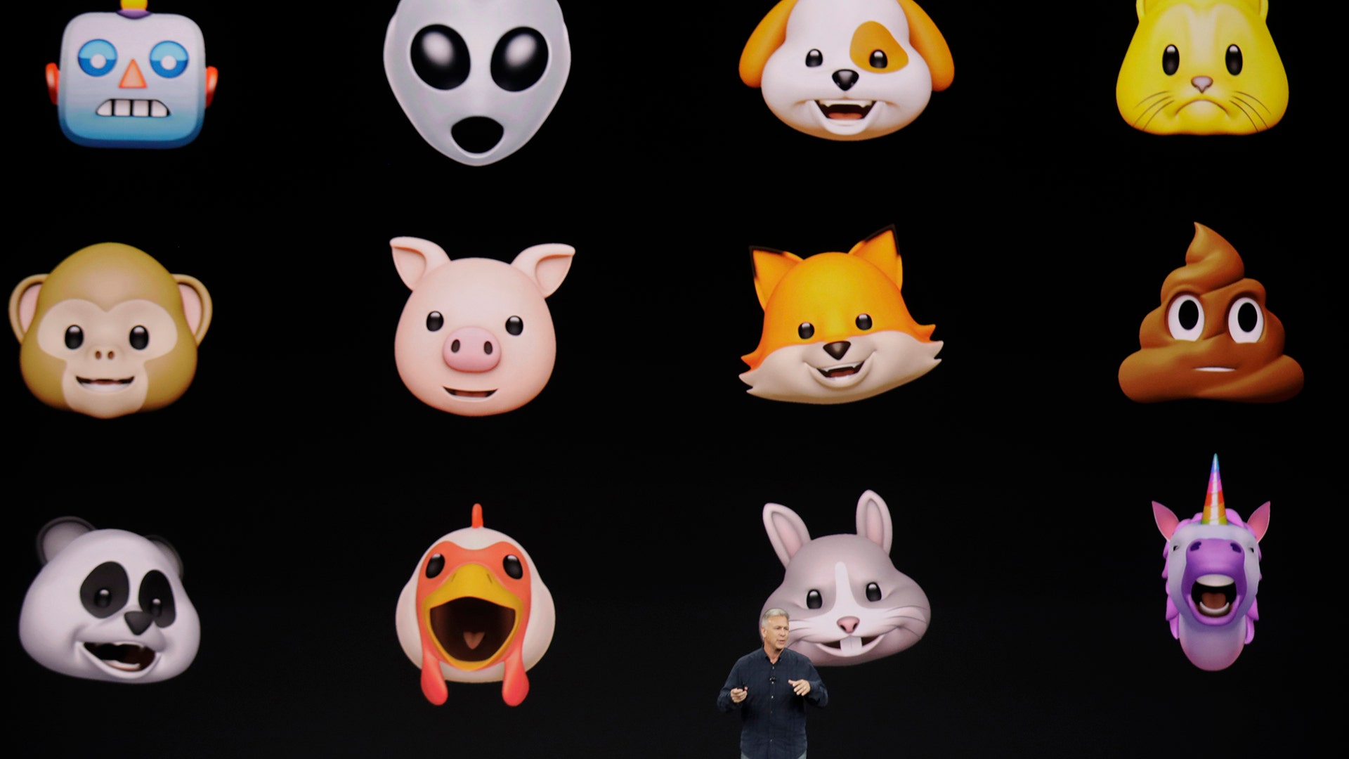 Phil Schiller, Apple's senior vice president of worldwide marketing, shows new emojis for the iPhone in Cupertino, Tuesday