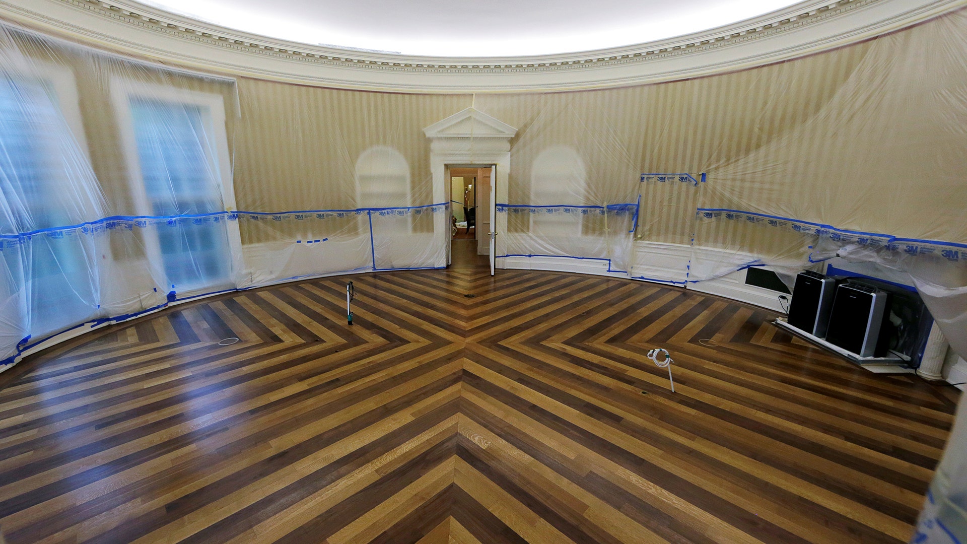 During the construction, the Oval Office was stripped of all furniture, carpet and decor.