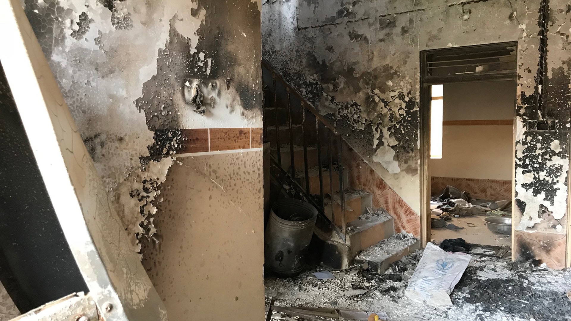 Human remains were found under this house in Tel Afar, one of many locations where recovery teams looked for ISIS victims