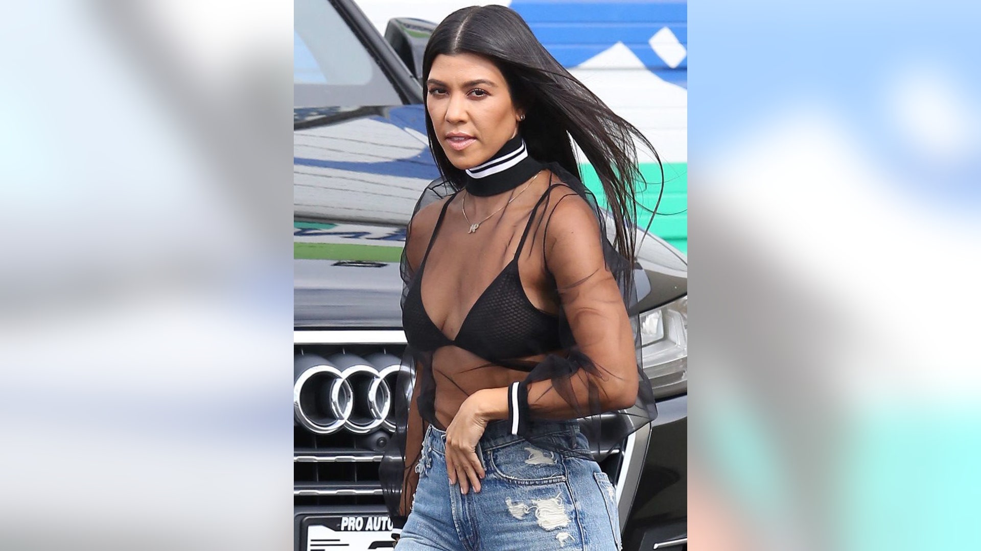 Kourtney Kardashian was spotted in a sheer top, flaunting her trim shape, with jeans and heels. X17online.com