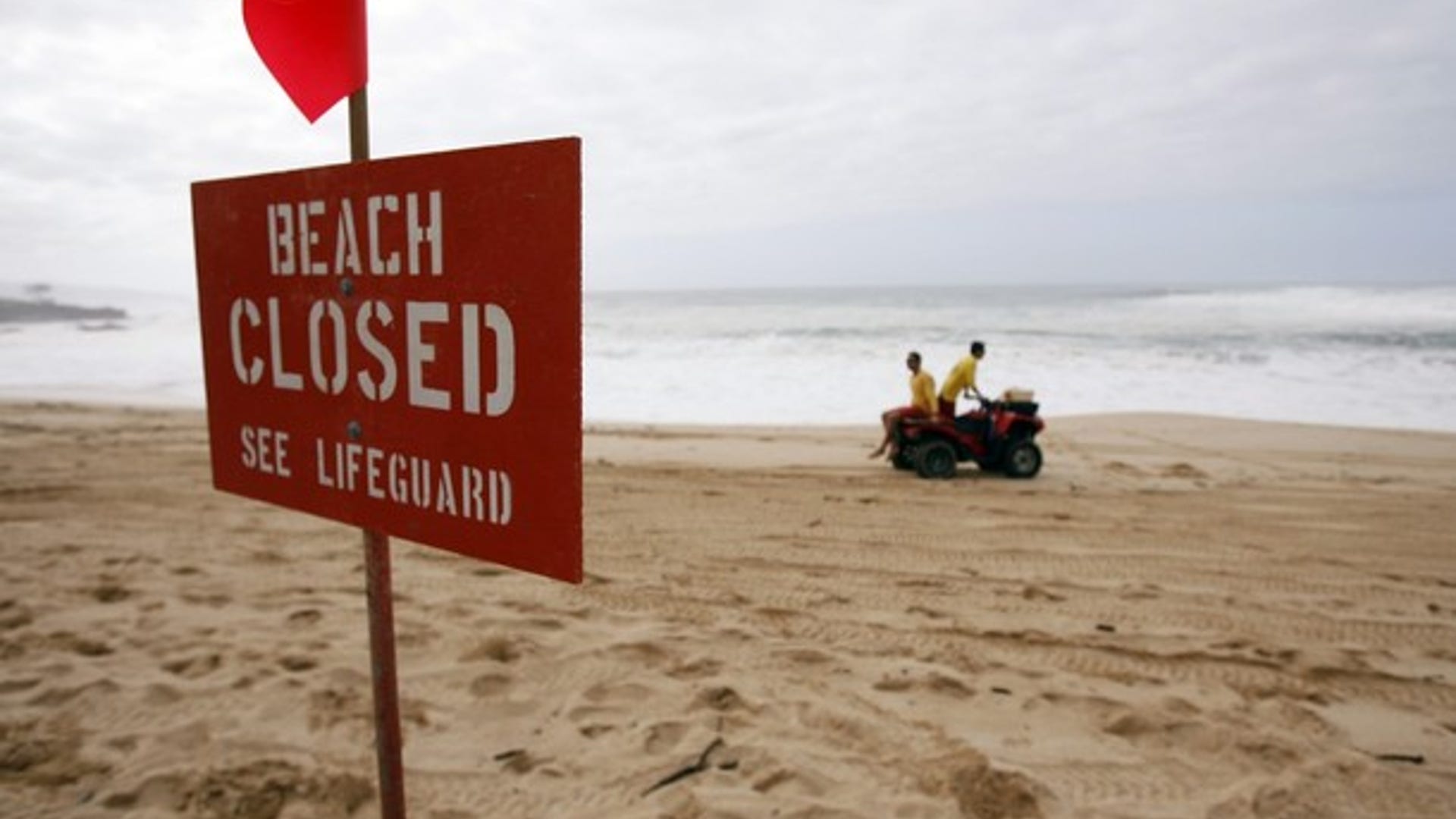 Surfers Take On Giant 30-Foot Waves in Hawaii
