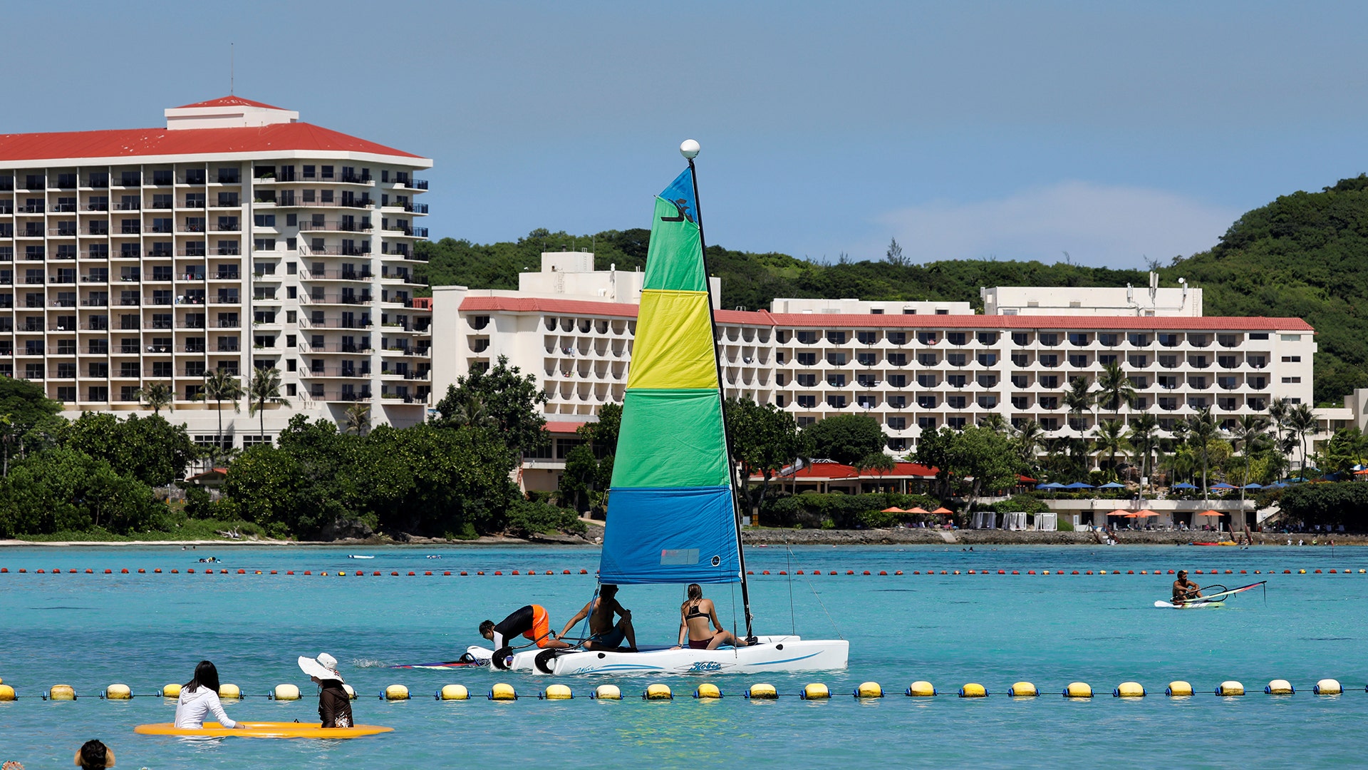 Tourists near Hilton Hotel on the island of Guam, August 11, 2017.