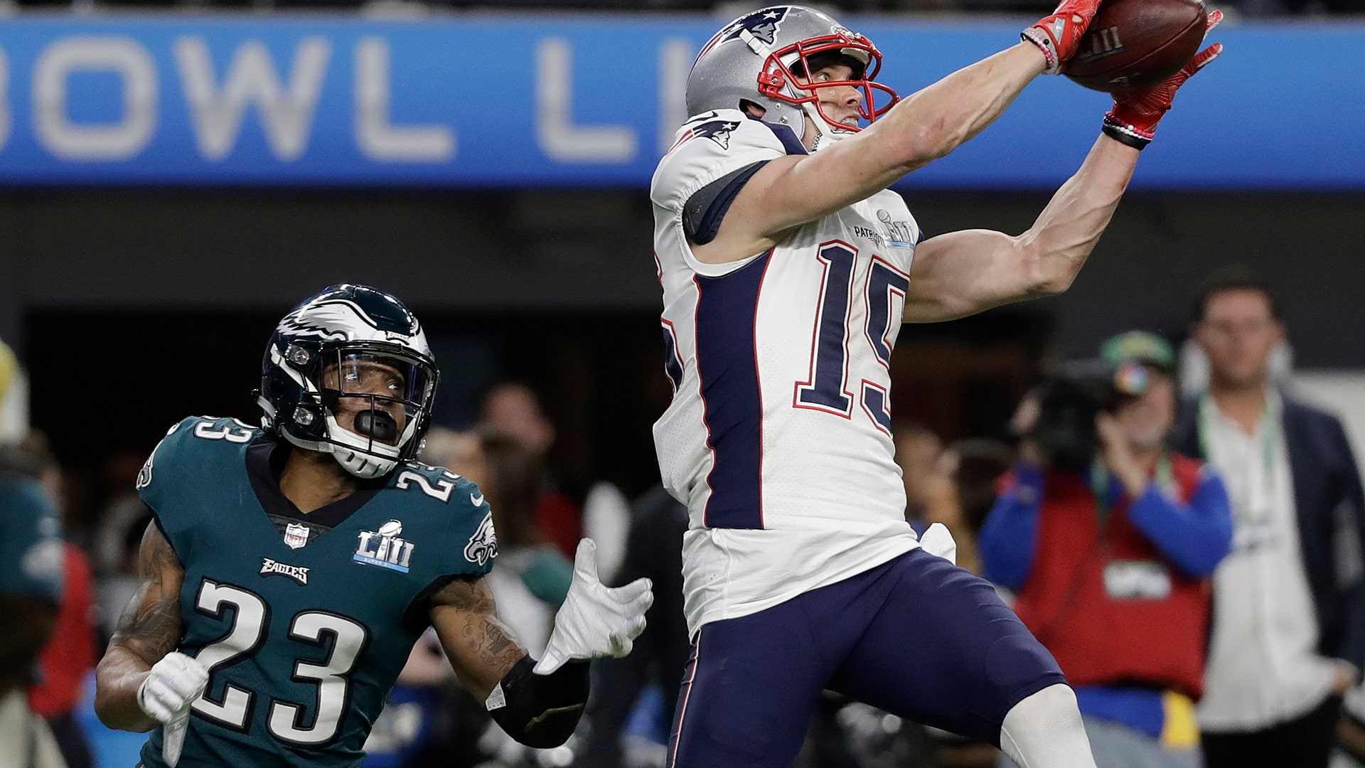 New England Patriots' Chris Hogan catches a touchdown pass during the second half of Super Bowl 52