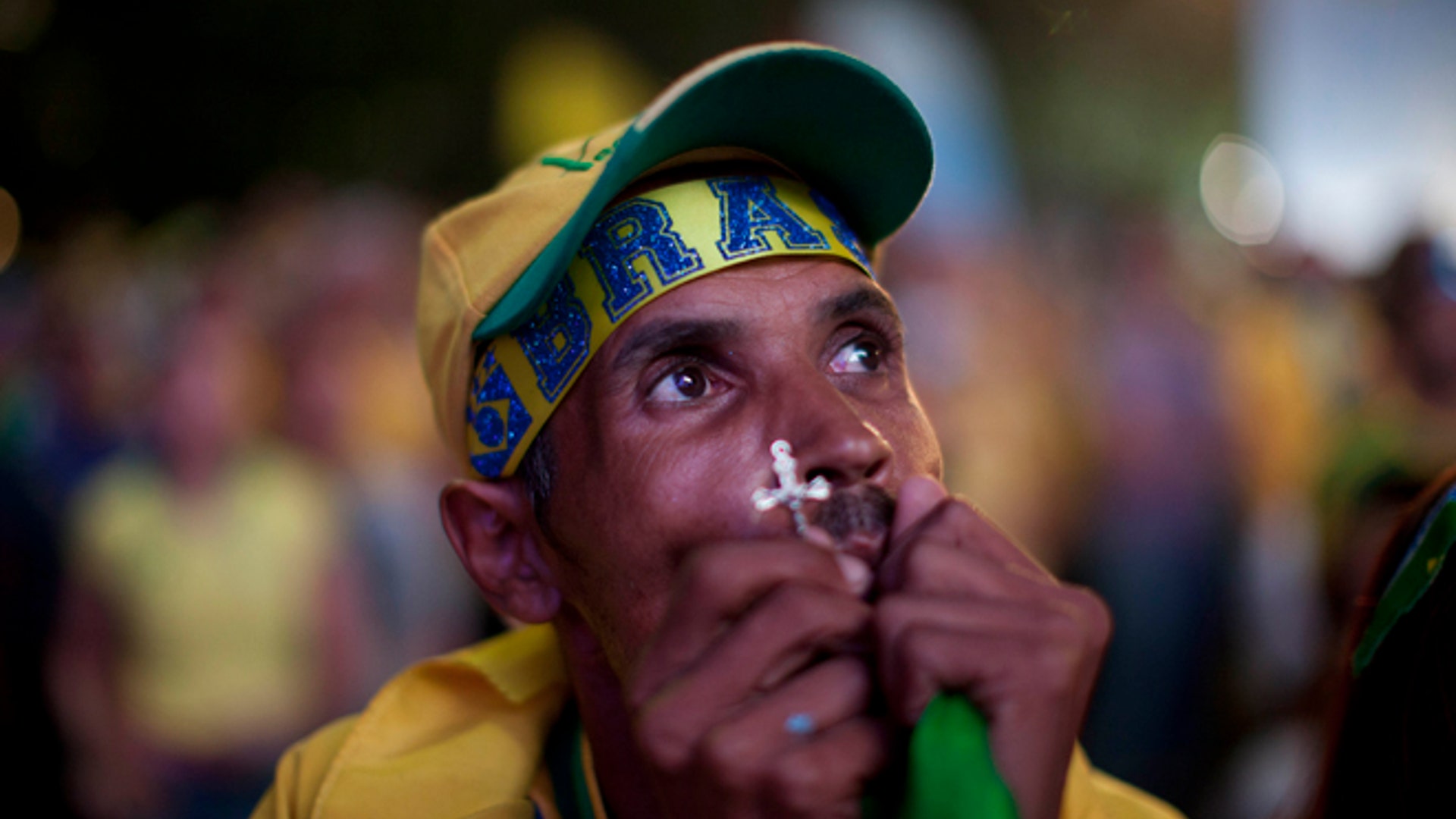 AP_Brazilian_Man_Praying