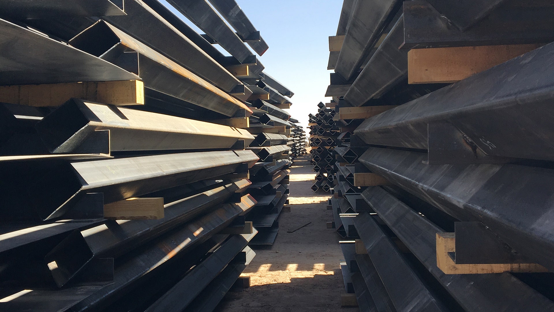 Stacks of steel bollard fencing are a part of the new bollard style wall, one of three going up this year along the U.S.-Mexican border