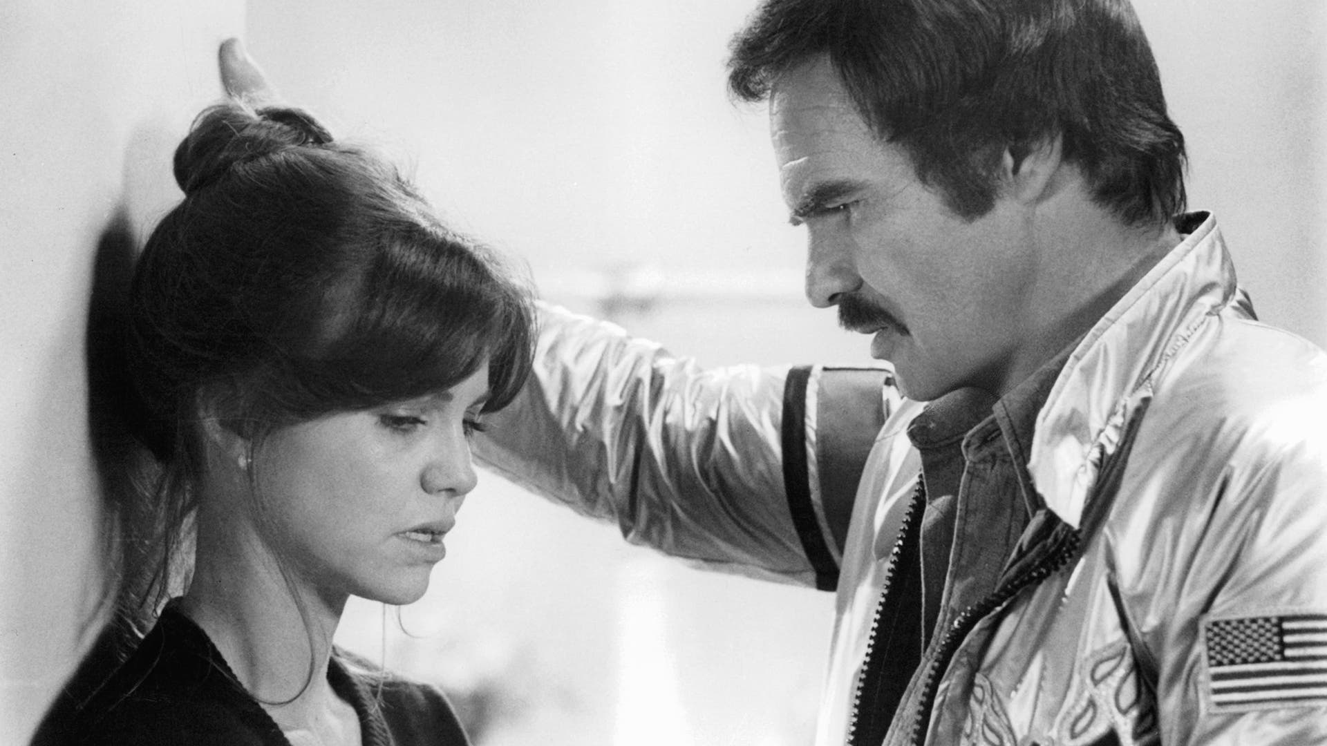 Sally Field talks with Burt Reynolds on the set of the 1978 film 'Hooper.'