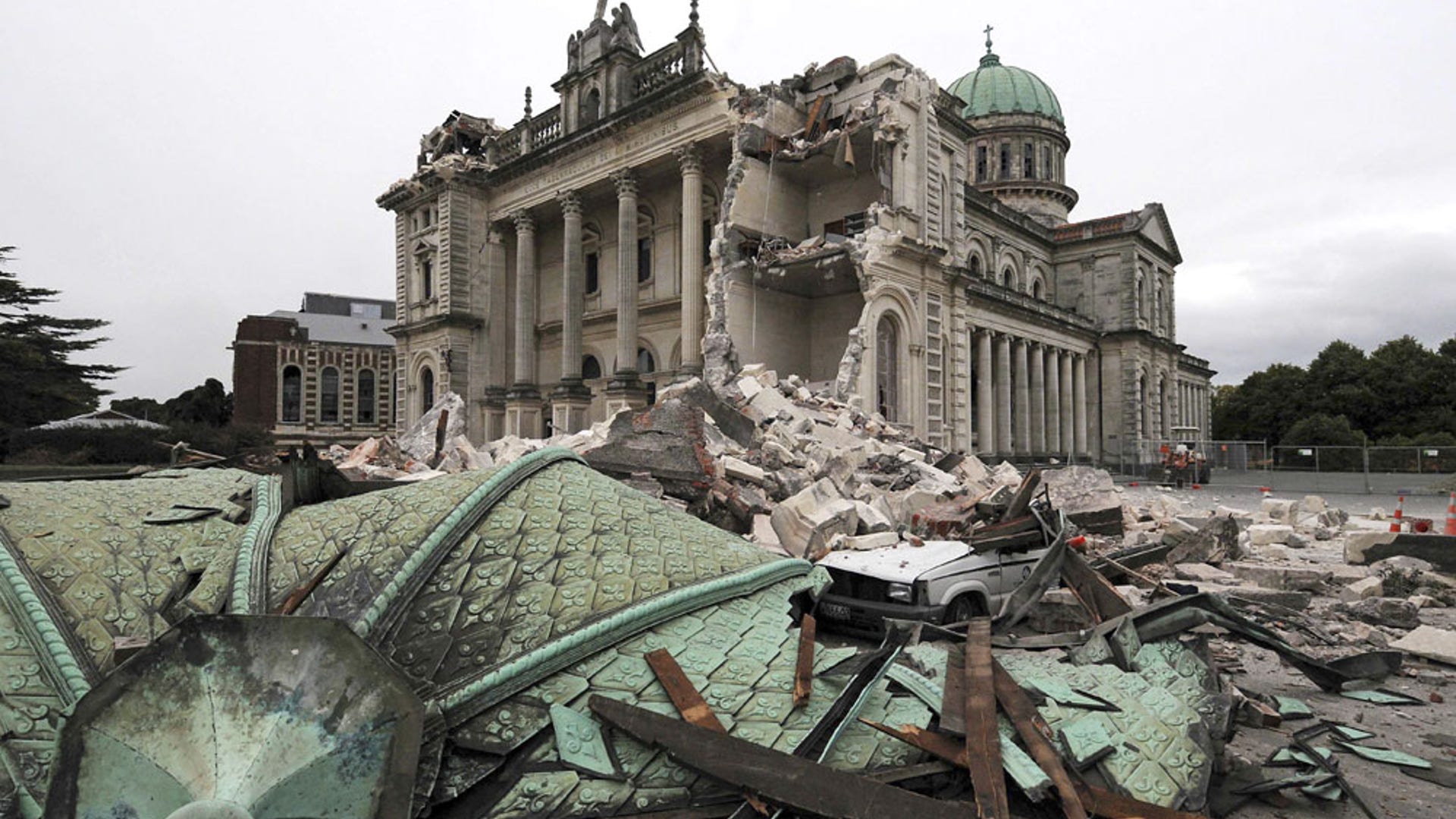 Debris_Crushes_Car_Outside_Cathedral
