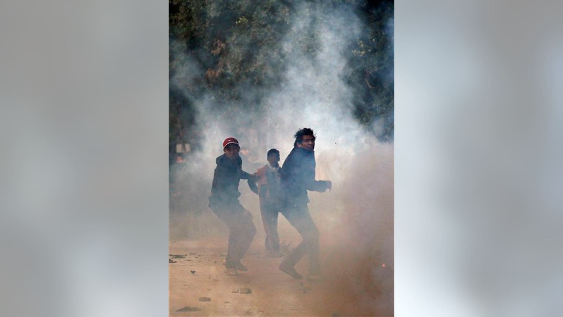 Demonstrators_throw_stones_at_police_during_clashes