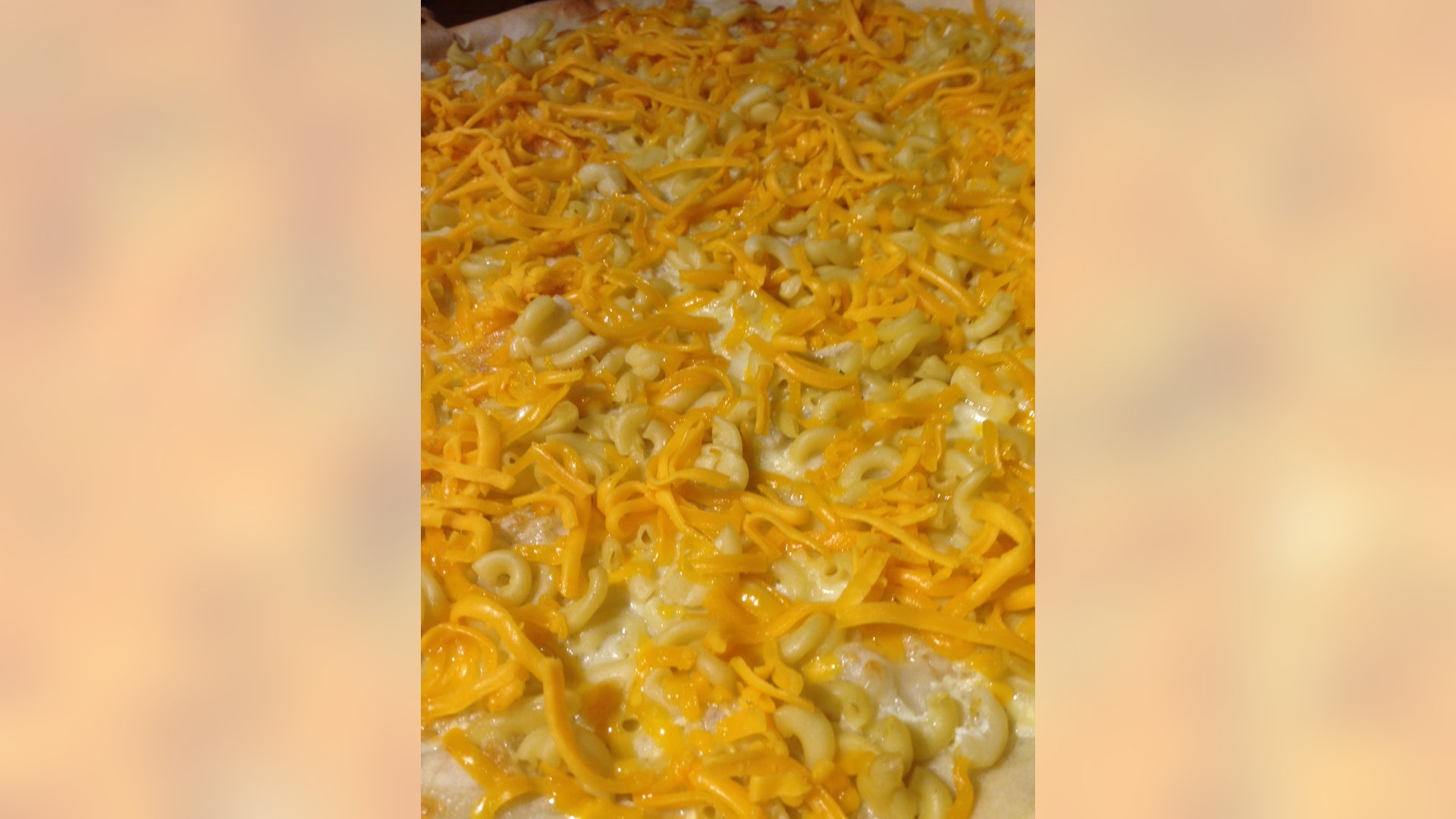 Mac and cheese covered pizza. That's one cheesy pizza.
