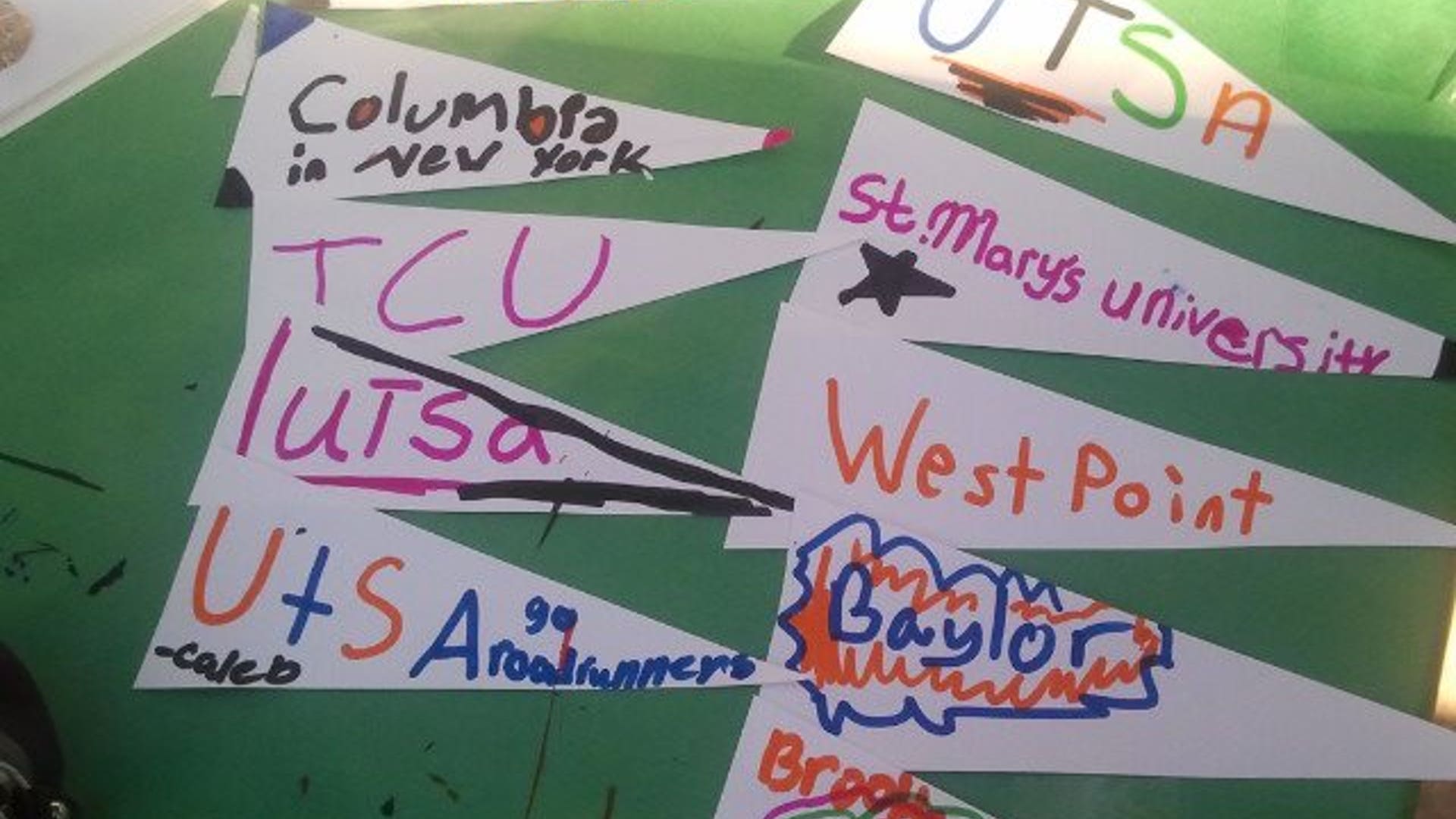 Elementary_schoolers_decorated_college_banners