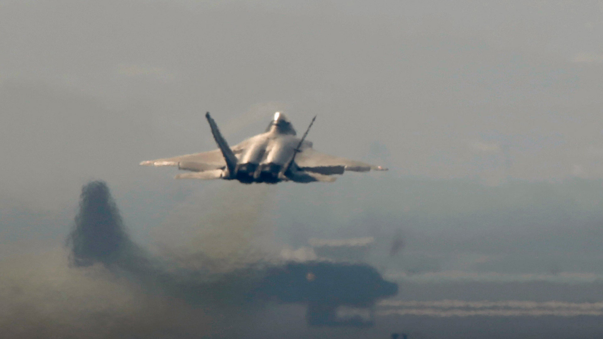 F-22 takes off