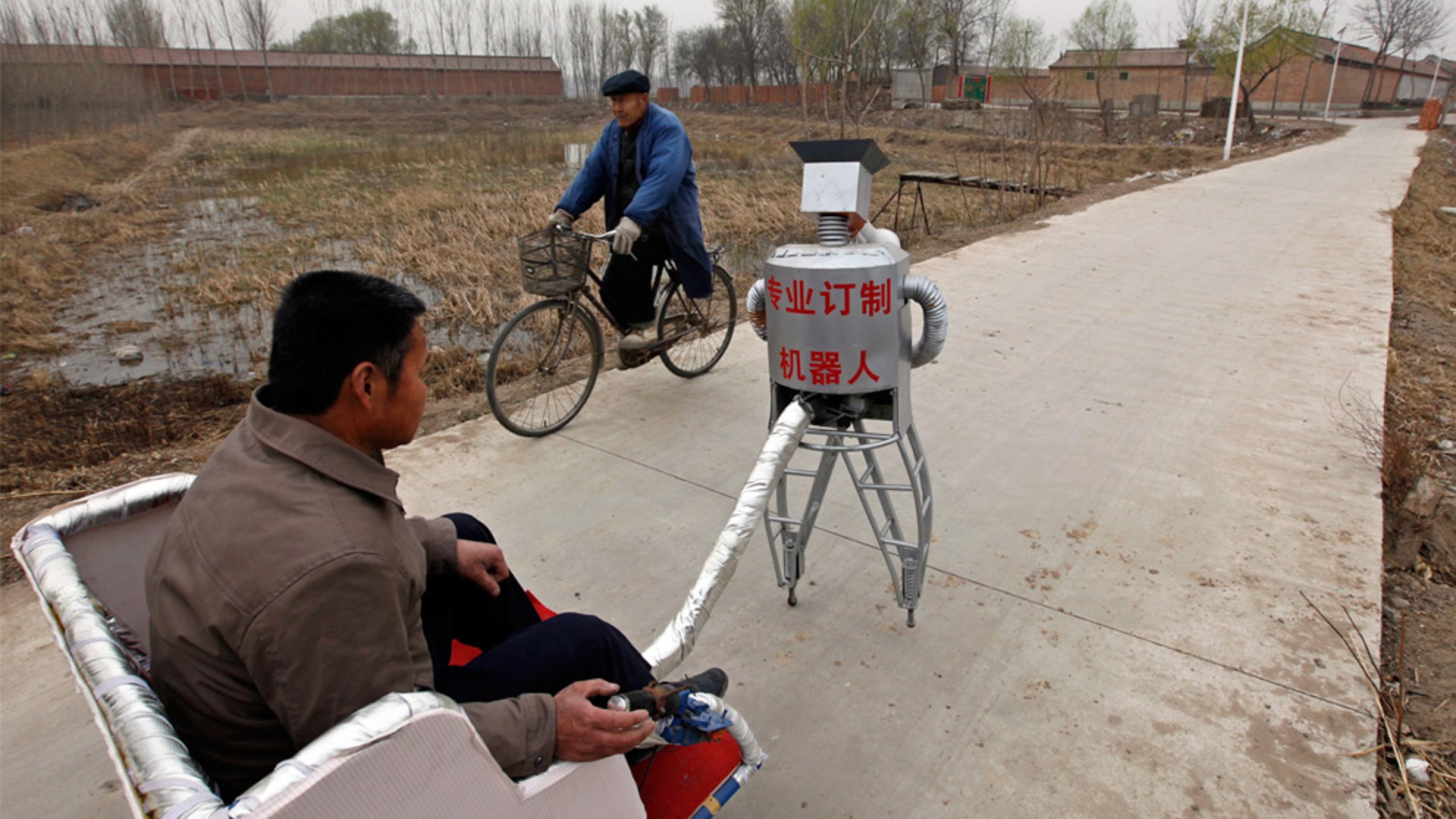 Farmer_With_Walking_Robot