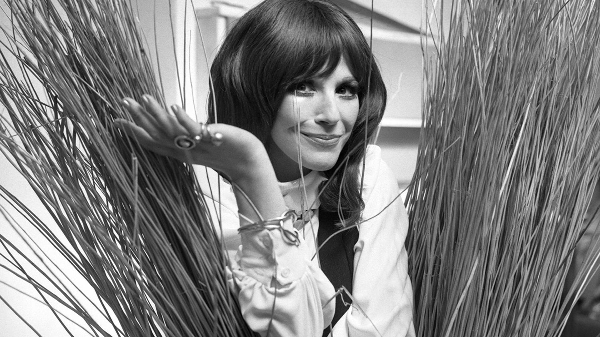 In this Sept. 16, 1971, Fenella Fielding poses ahead of a one woman entertainment piece at the Withy Arts Festival in Somerset, England. British actress Fenella Fielding, the glamorous, velvet-voiced star of