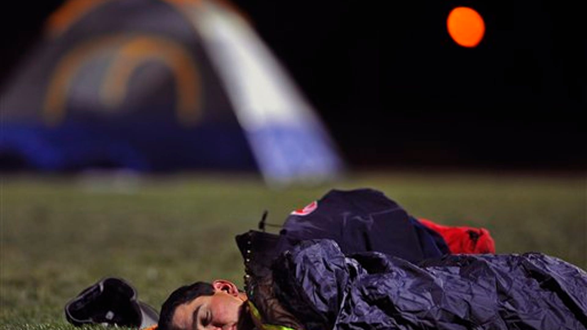 Firefighter_Rests_After_Battling_Wildfire