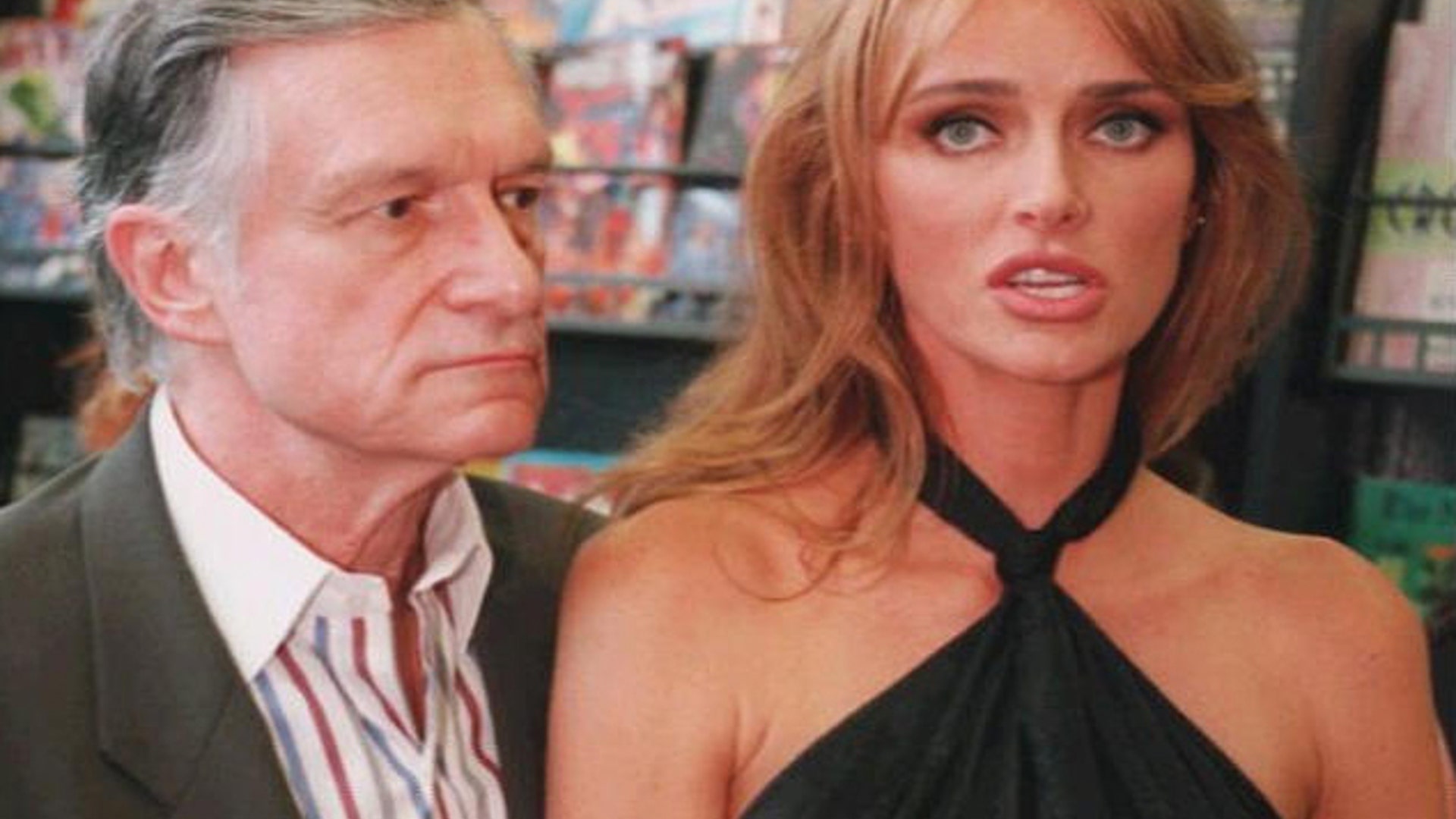 Hugh Hefner and Kim Conrad 