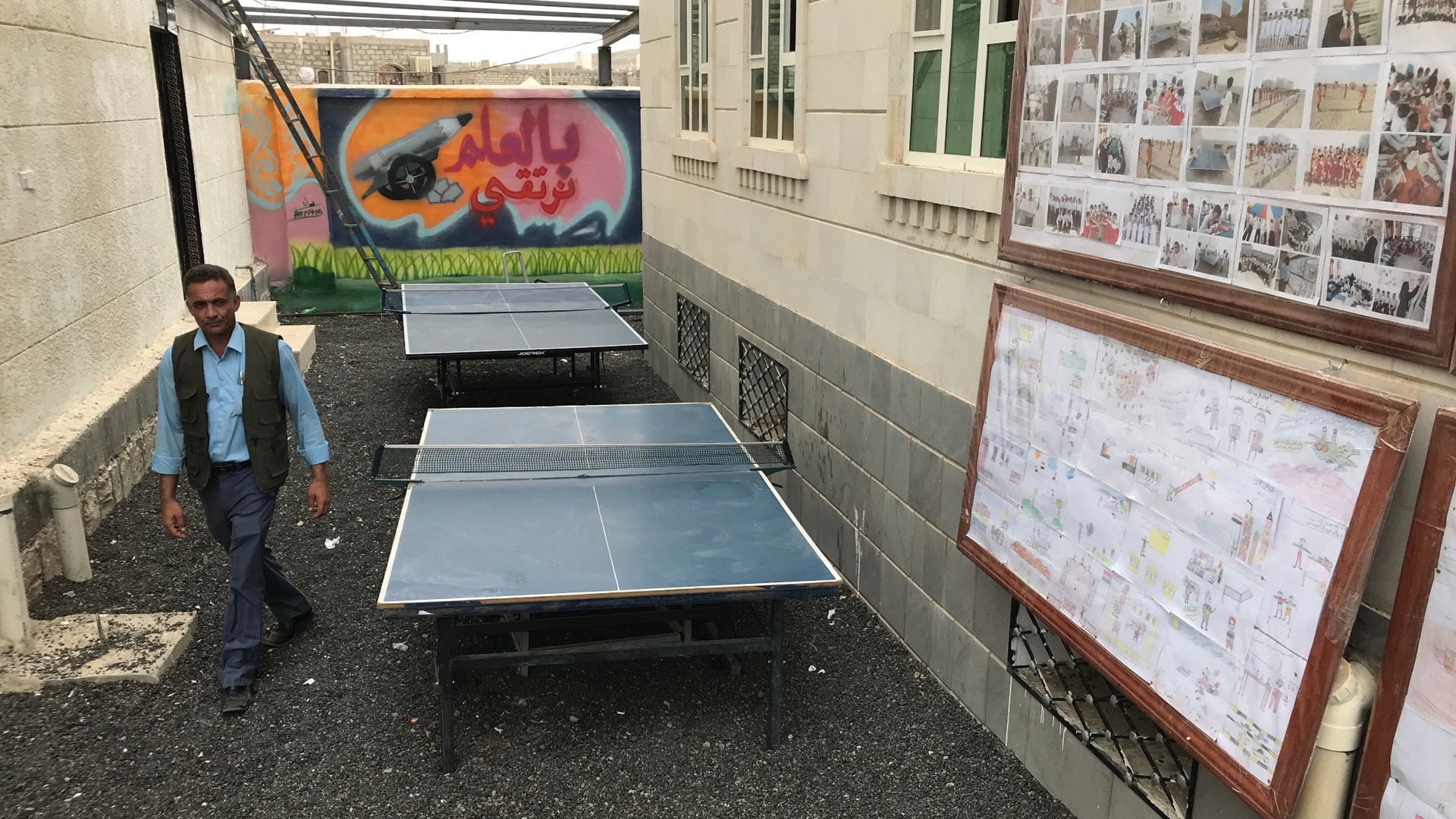 The KS Relief Center offers students fun activities, which include ping-pong and arts and crafts.