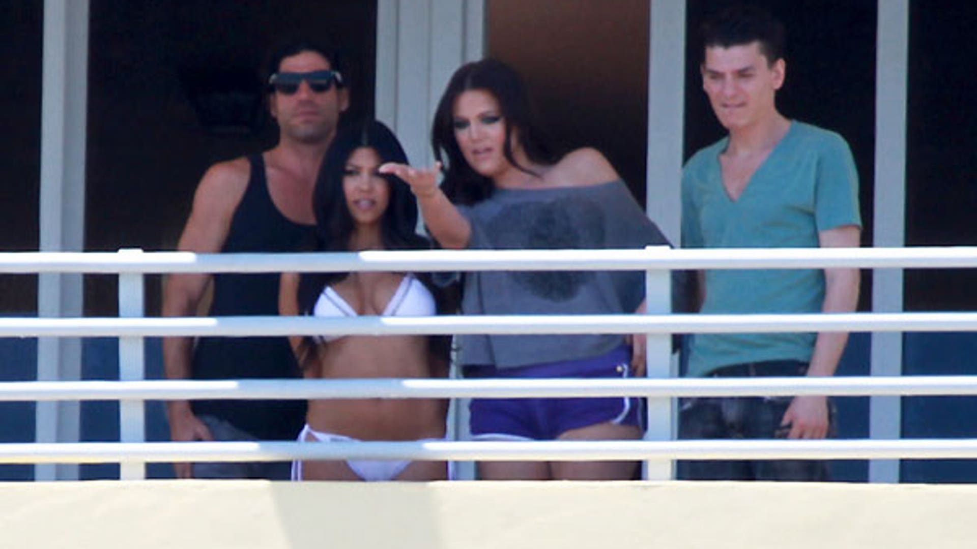 Khloe Kardashian Flashes Photographers