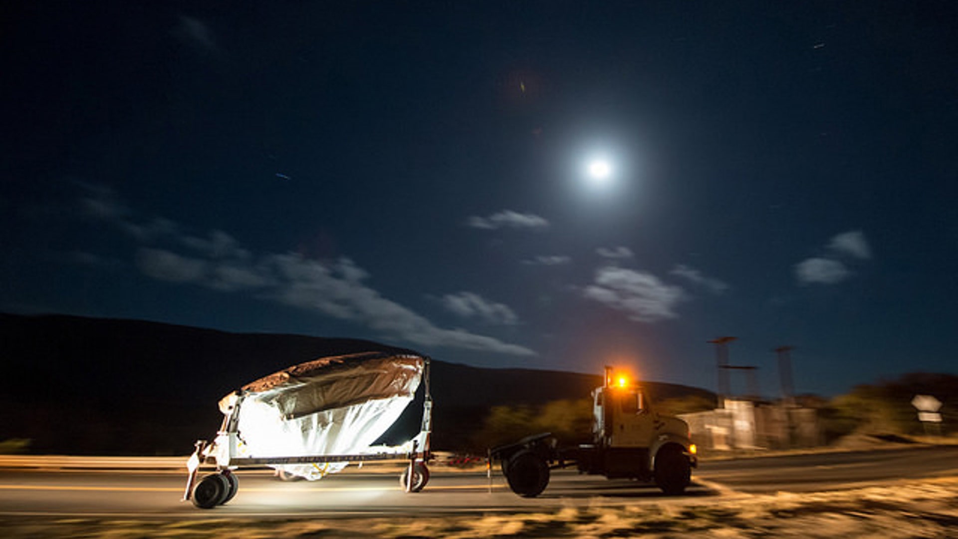 Test vehicle heads to the launch pad
