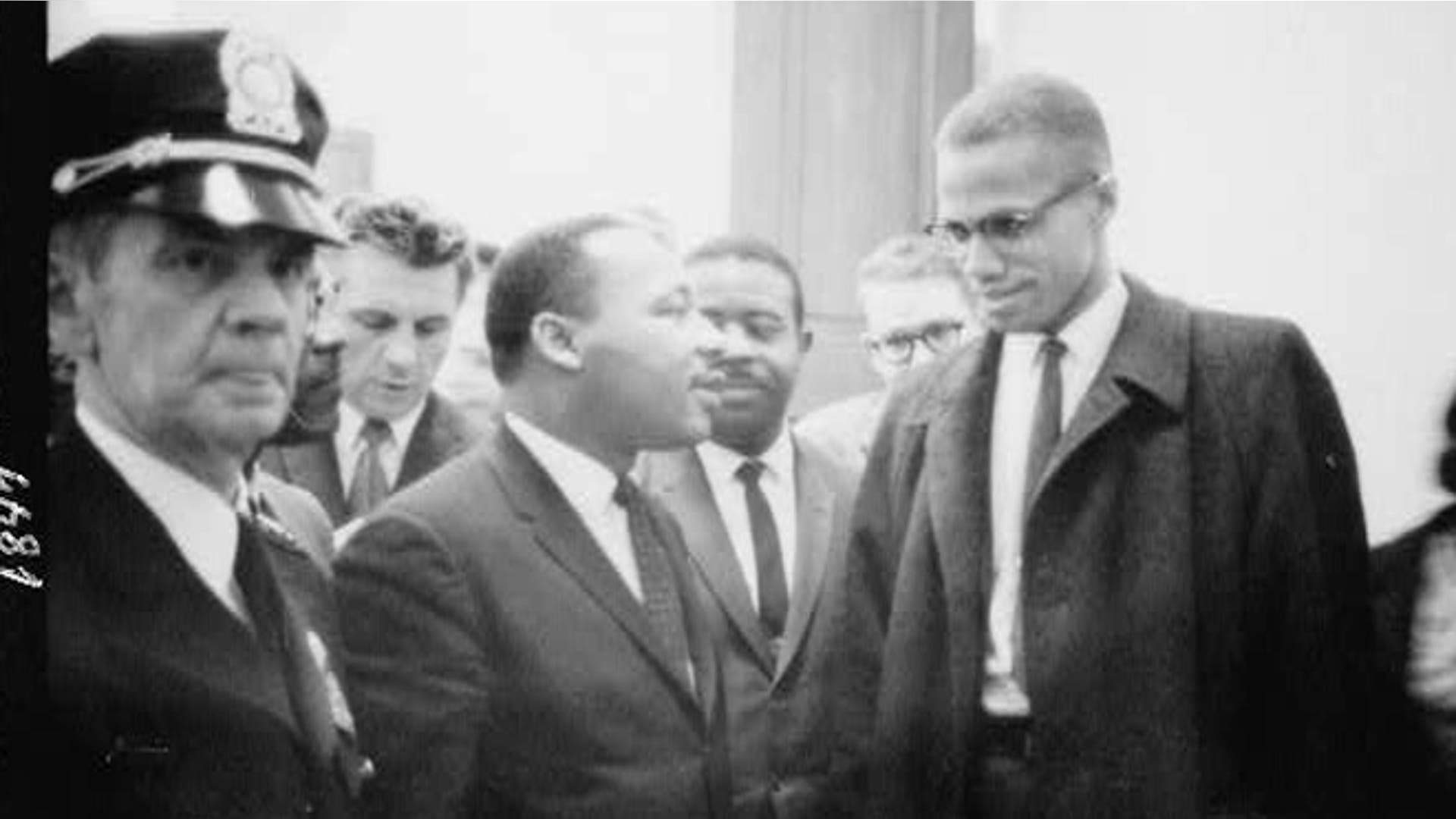 Martin Luther King Jr. and Malcolm X waiting to speak at a press conference on March 26, 1964.