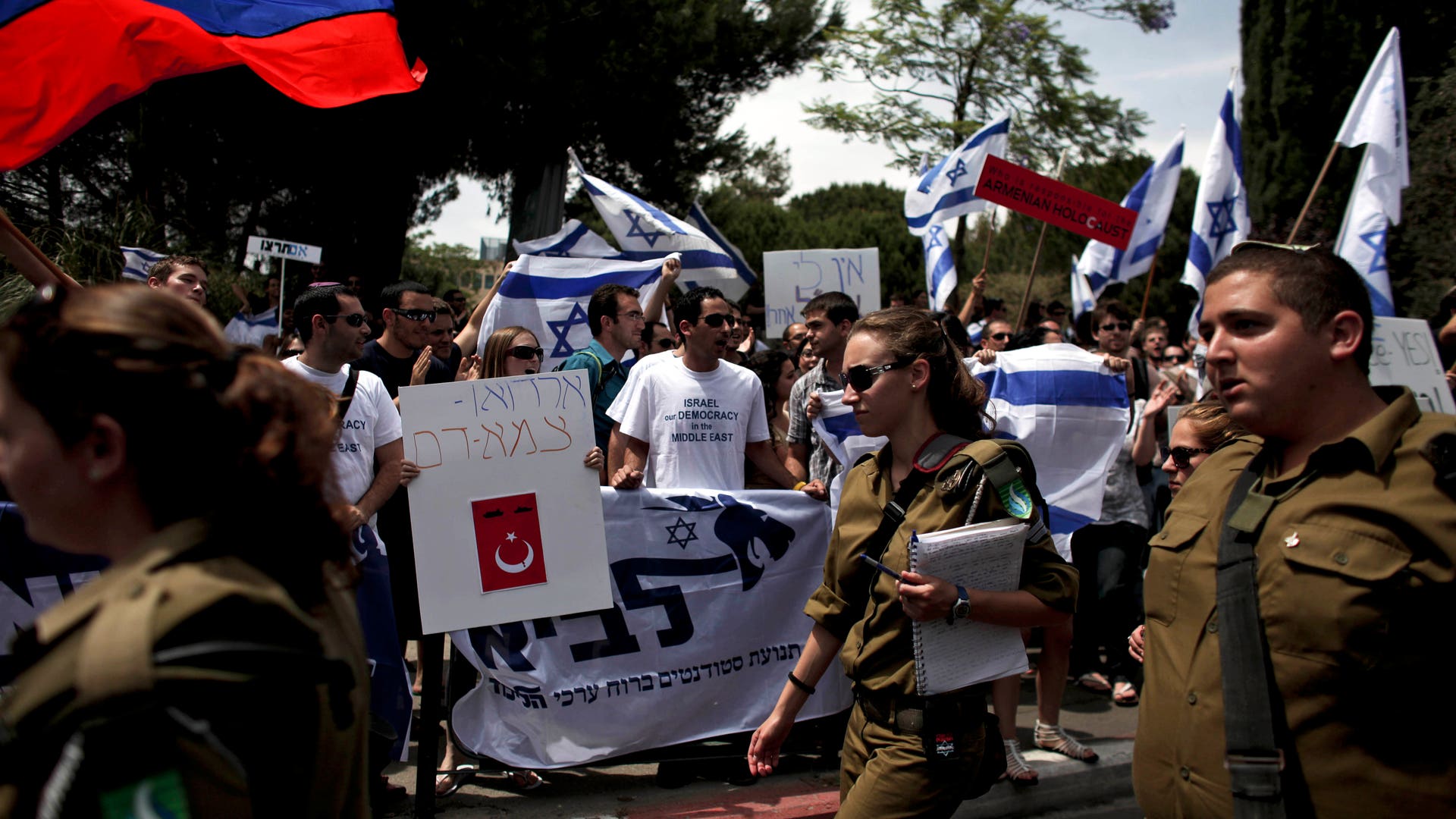 Israeli Soliders Passing by Supporters