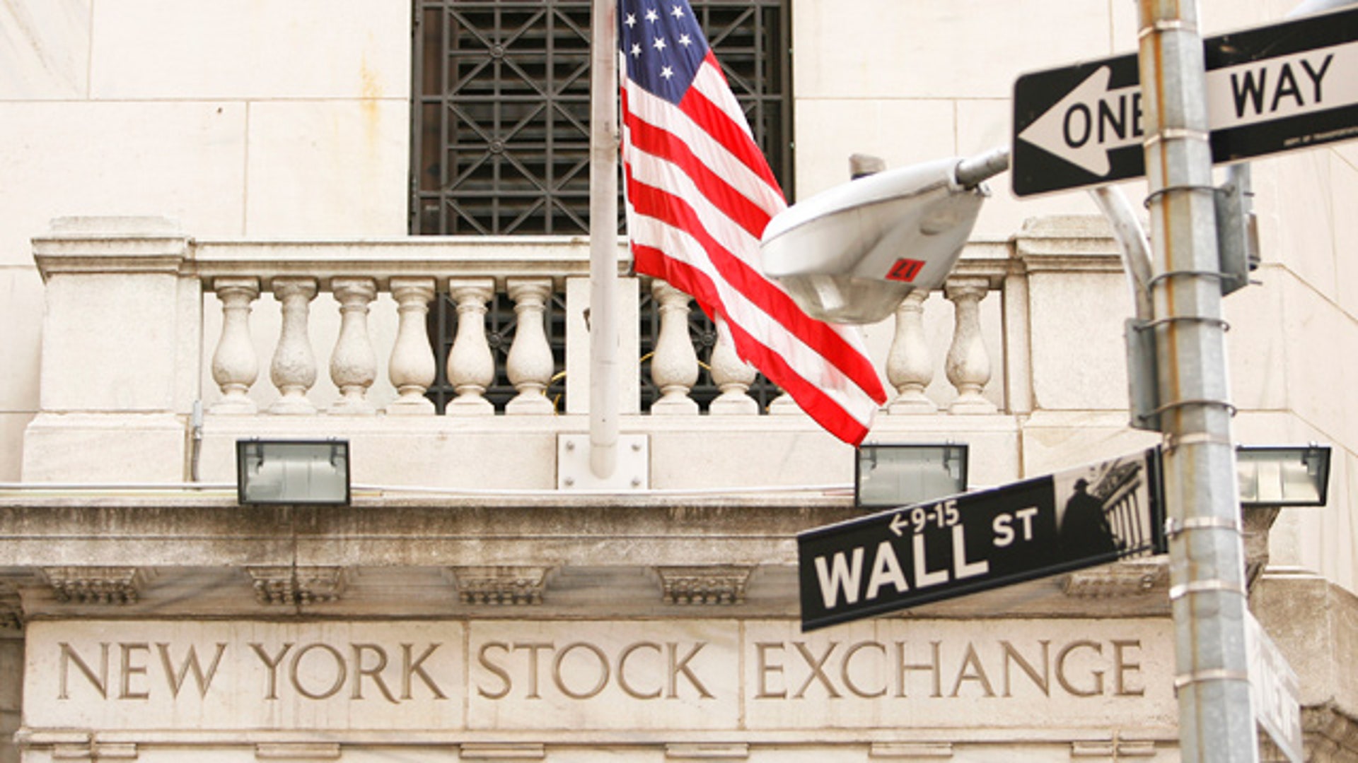 New York Stock Exchange With Wall Street Sign