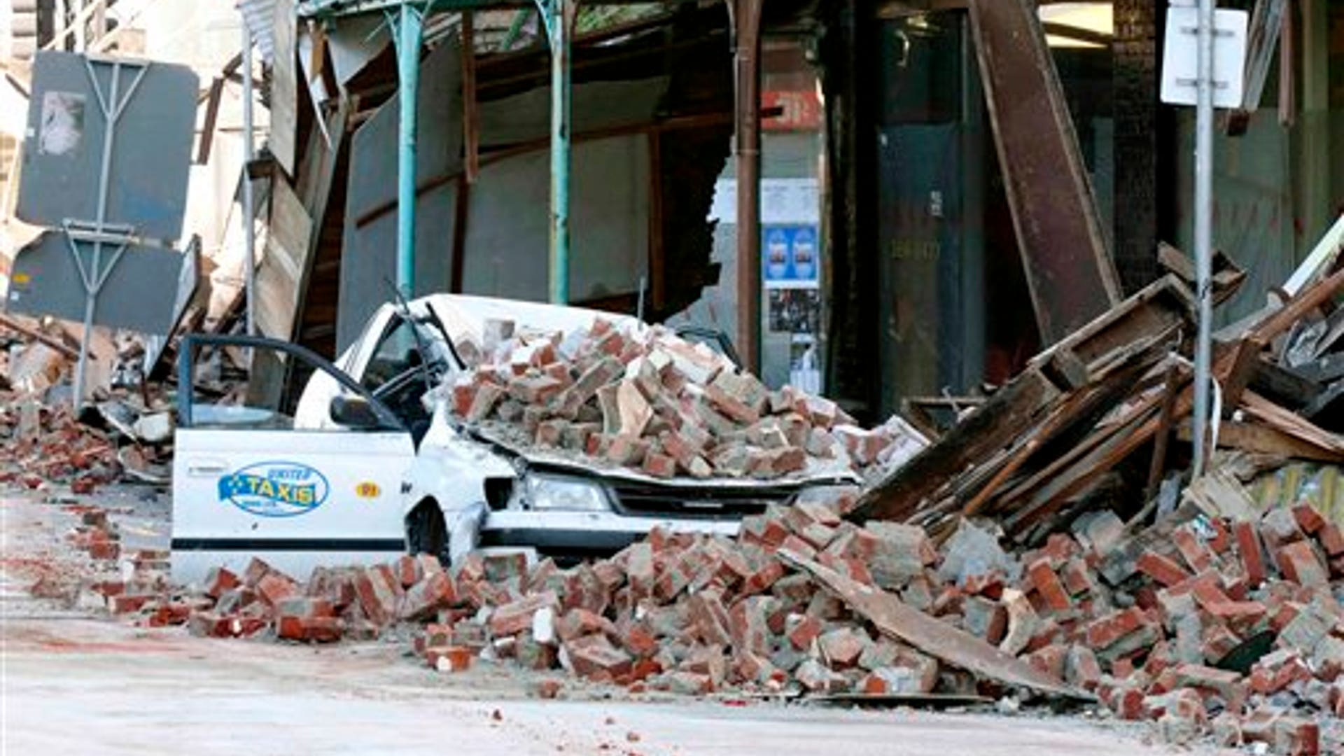 Car Flattened in Quake