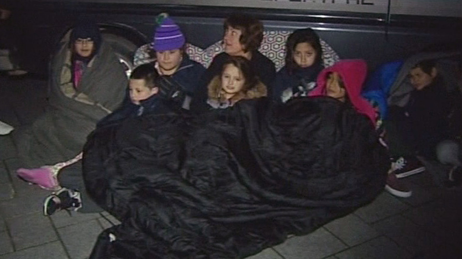 Children Huddle Outside