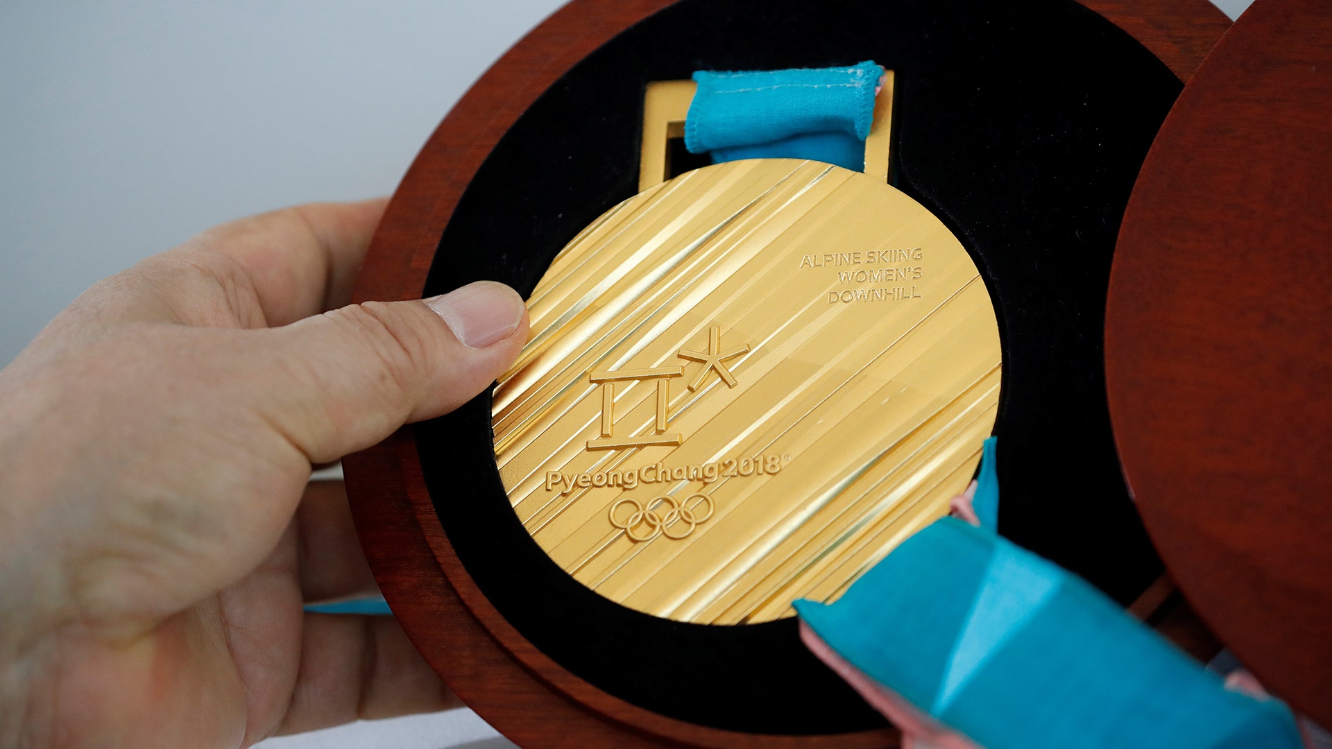 A gold medal for the Pyeongchang 2018 Winter Olympic Games during its unveiling ceremony in Seoul, South Korea, on Sept. 21, 2017