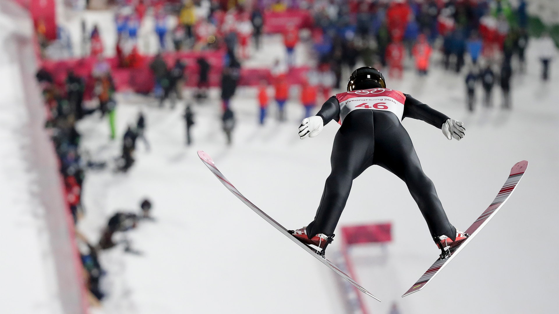 Johann Andre Forfang of Norway,soars through the air during the normal hill individual ski jumping 