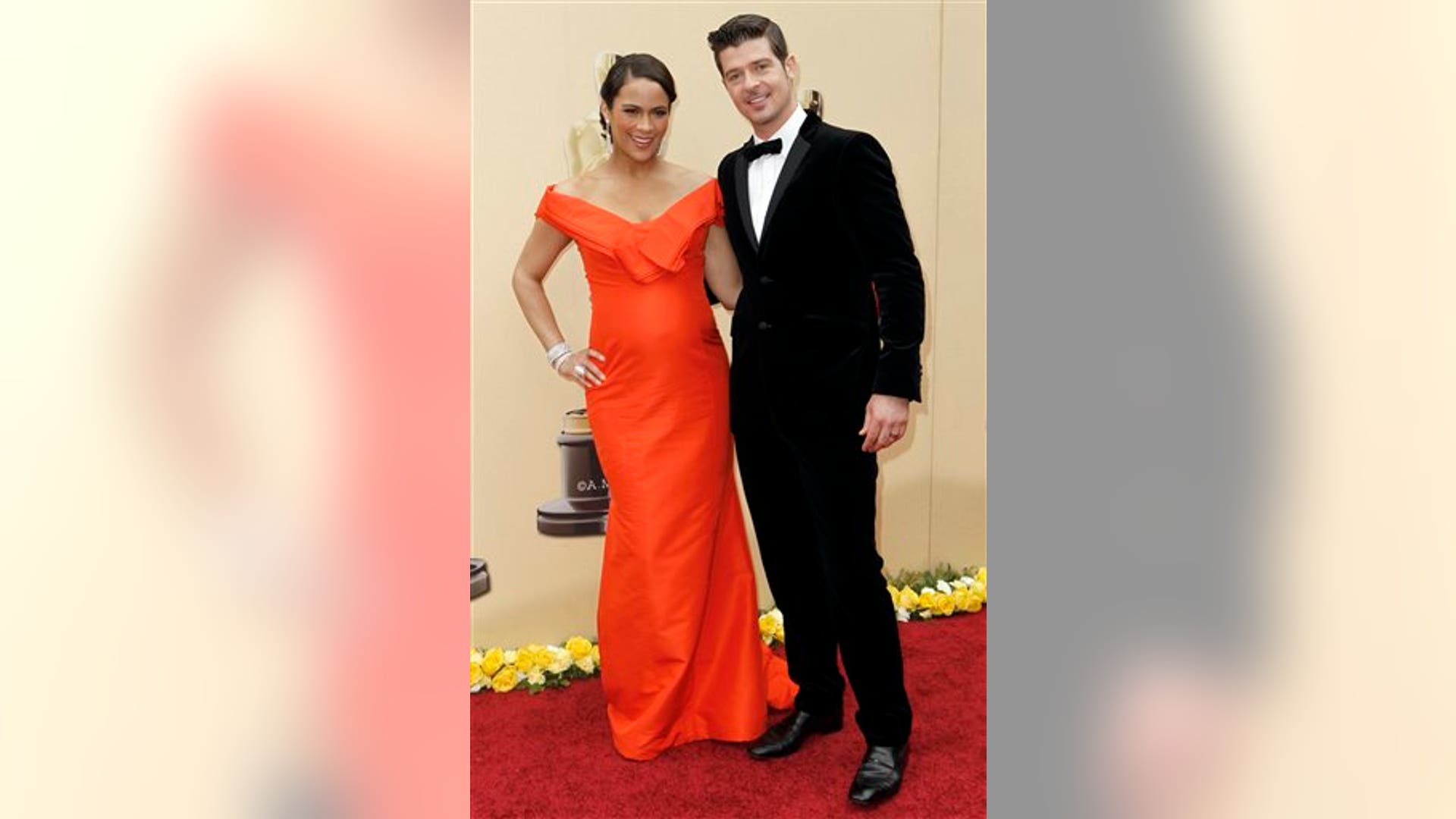 Paula_Patton_and_Robin_Thicke_jwkljjjip