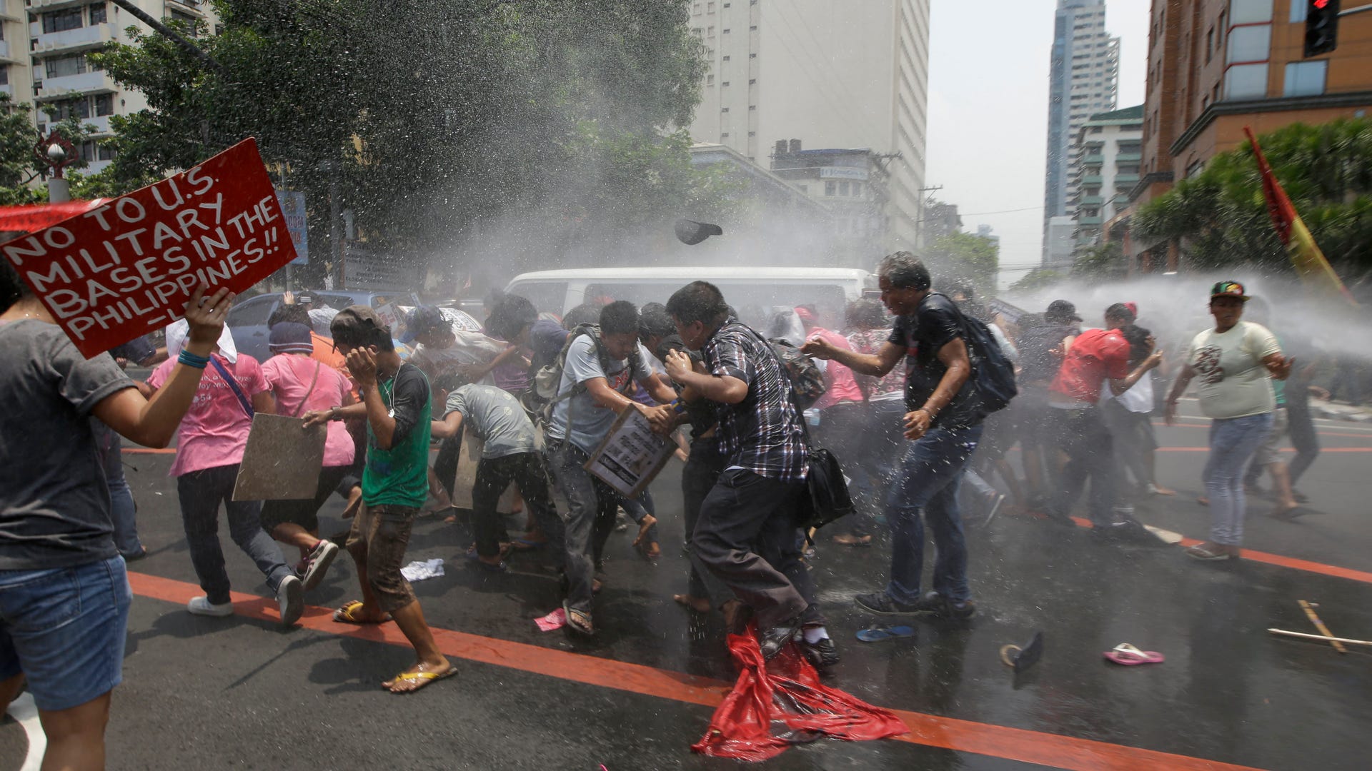 Activists protest President obama visit 