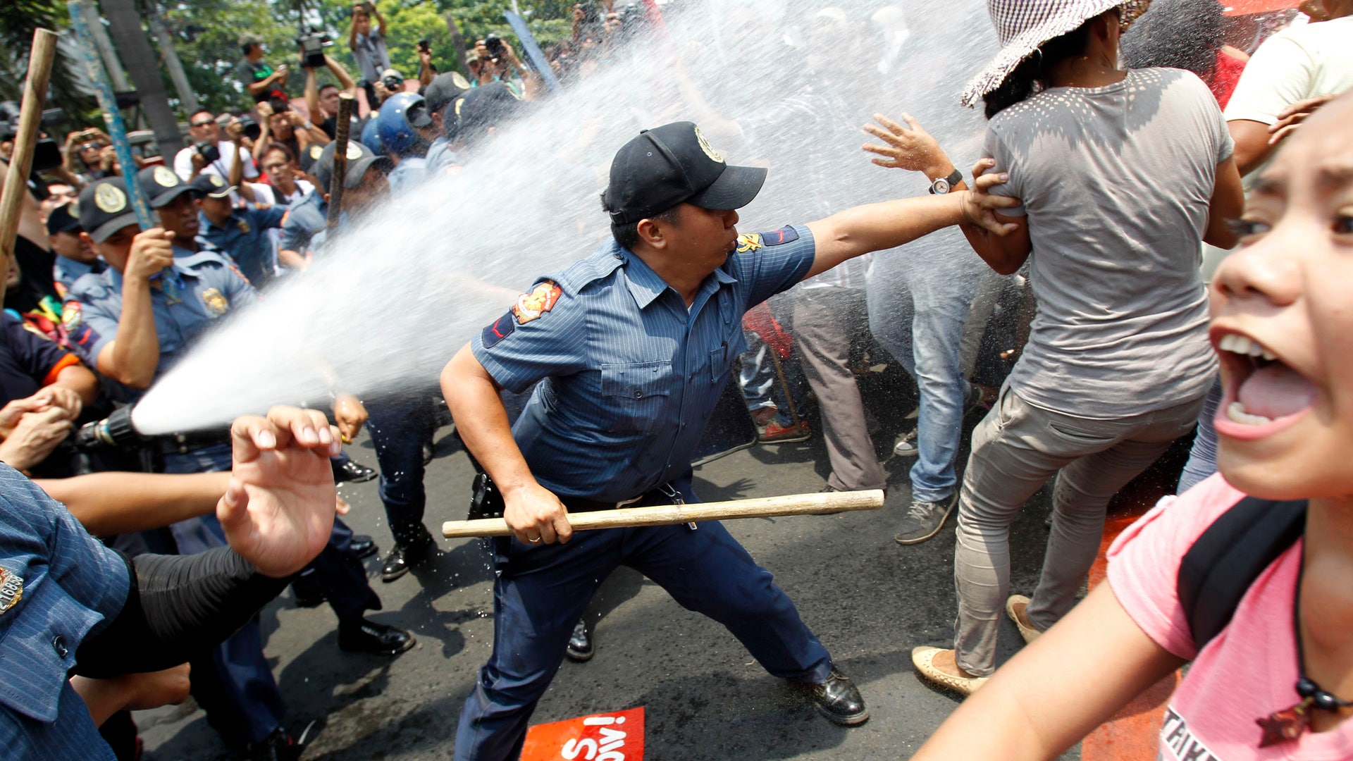 Activists protest President obama visit 