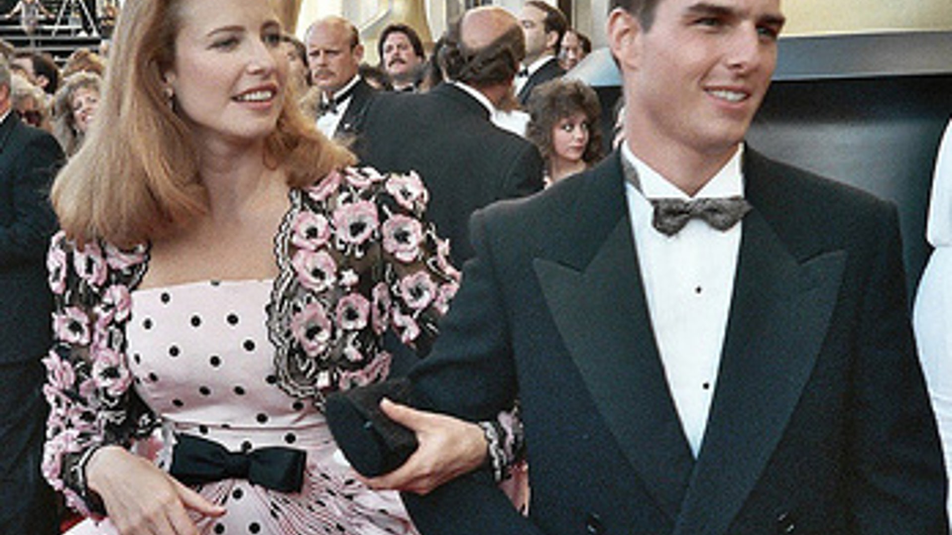 Tom Cruise and Mimi Rogers