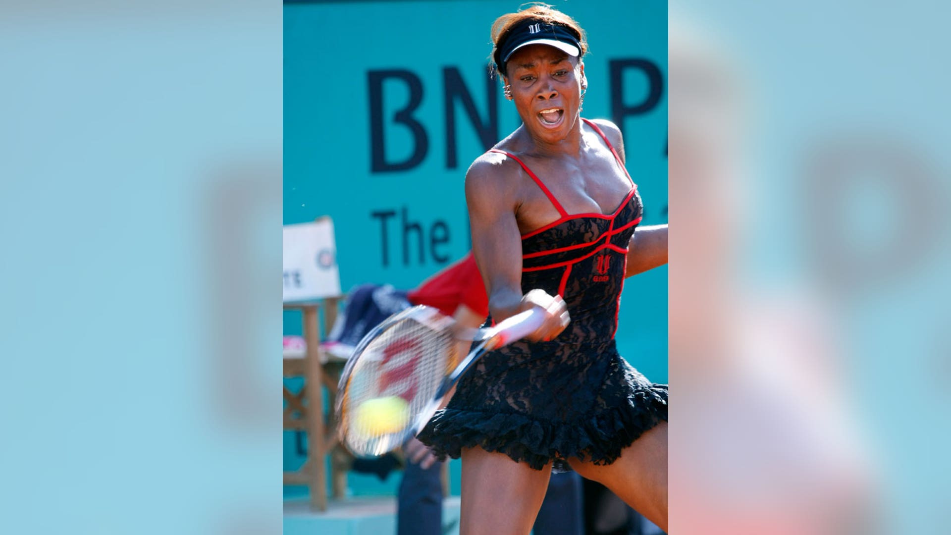 Venus at the French Open in a Red and Black Corset Number