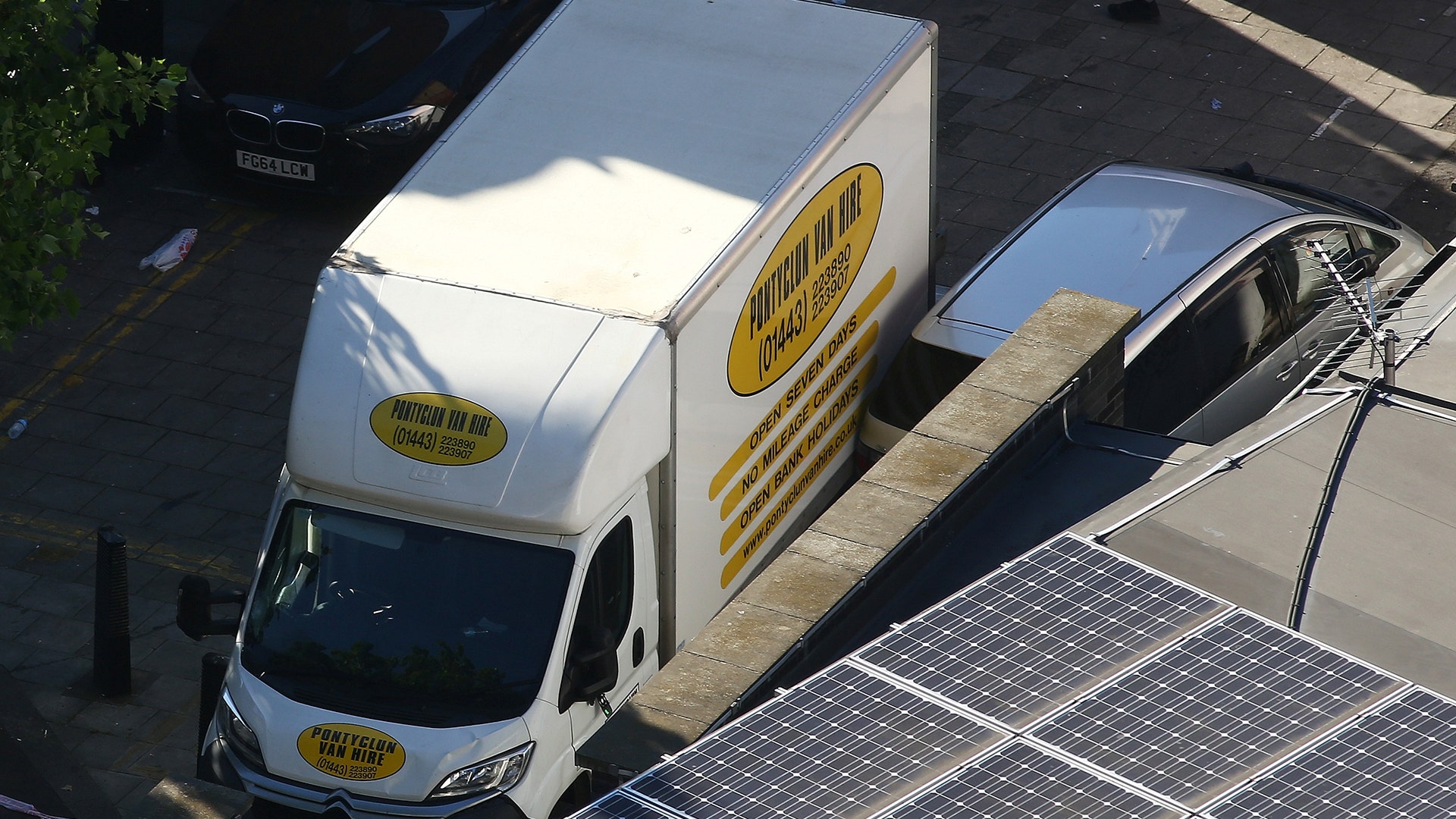 A white van is seen at the scene after a vehicle collided with pedestrians in the Finsbury Park neighborhood of North London, Monday