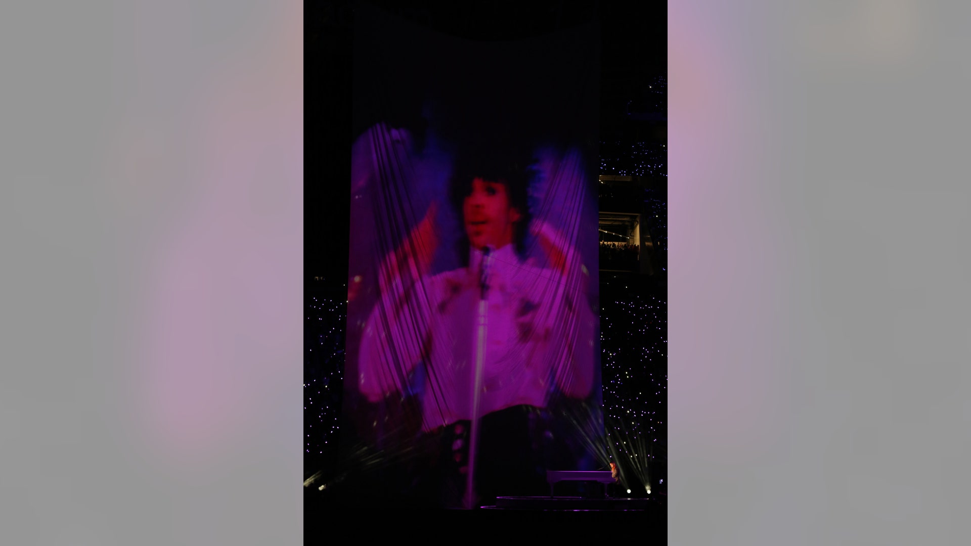 Justin Timberlake performs next to a projection of Prince during the halftime show in Super Bowl 52