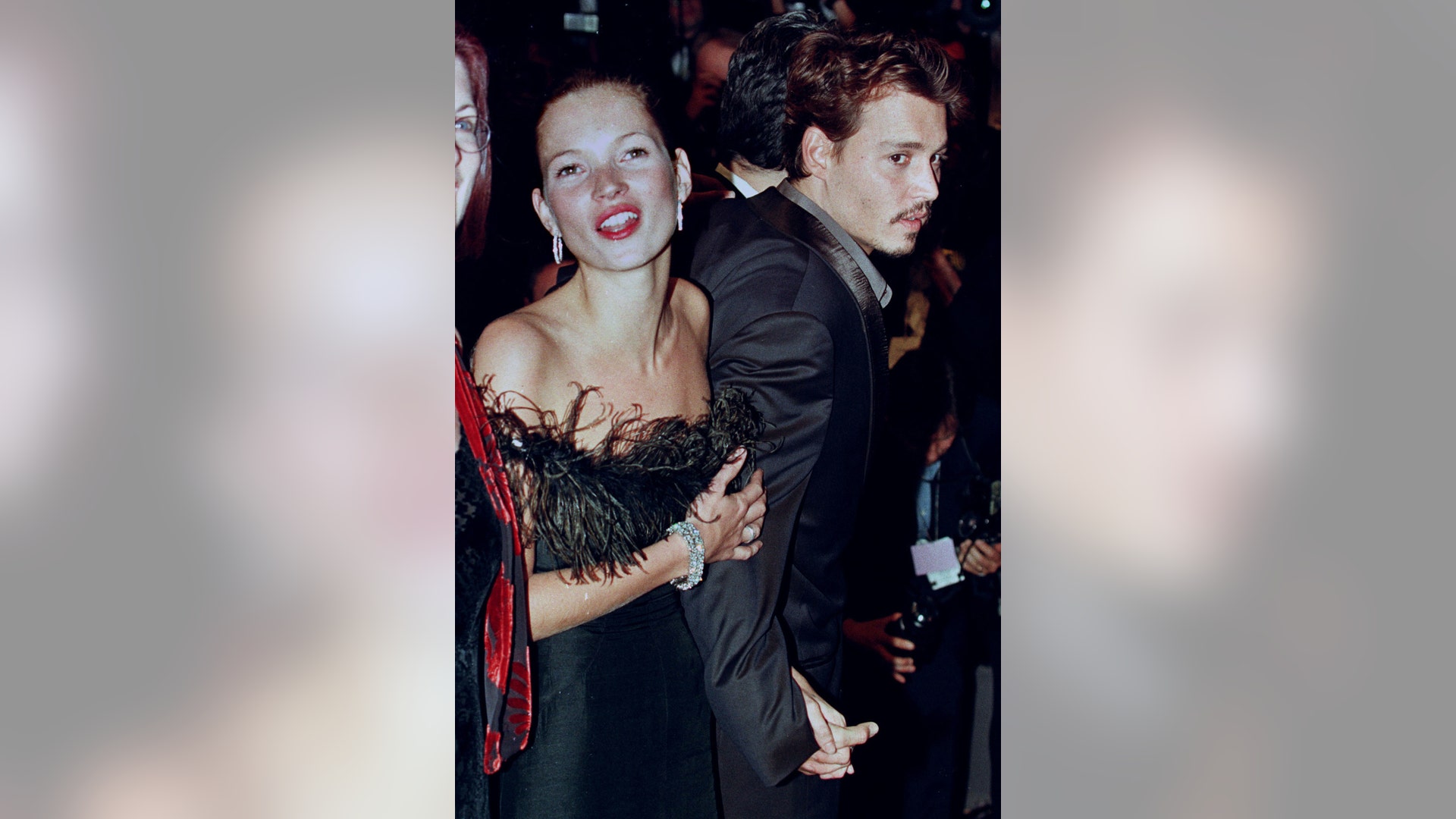 With British top model Kate Moss at the 51st Cannes Film Festival, May 15, 1998