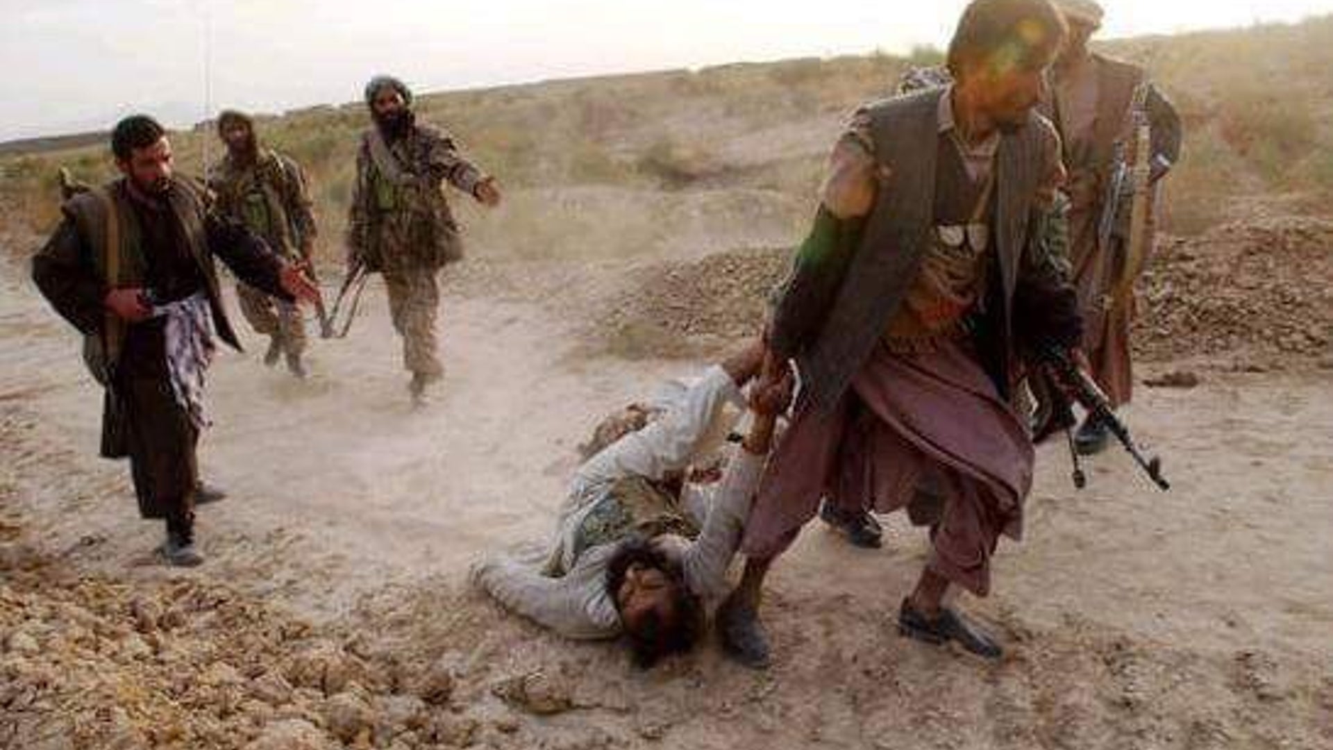 Soldier being dragged along the ground by a fighter