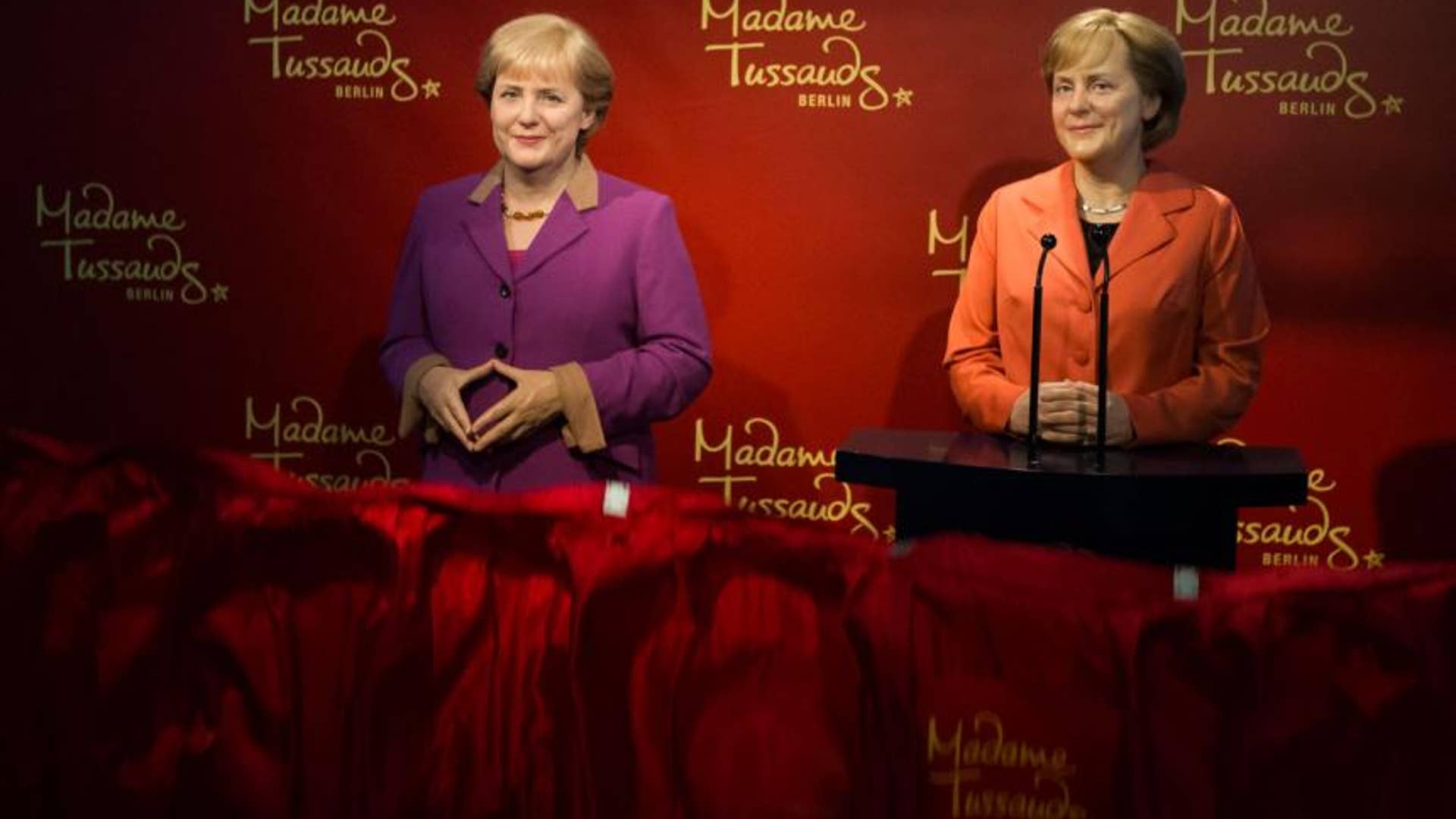 German Chancellor Angela Merkel AND a Wax Figure of German Chancellor Angela Merkel