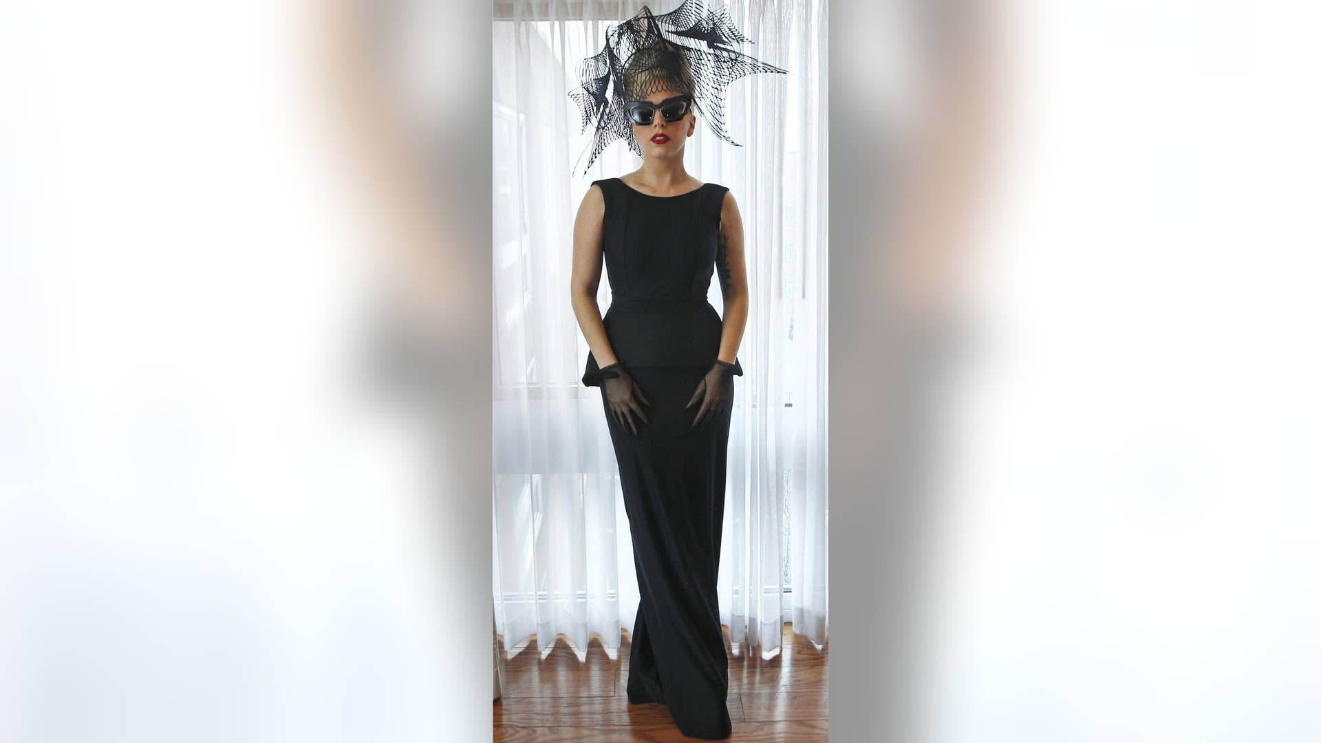 Posing in her hotel room