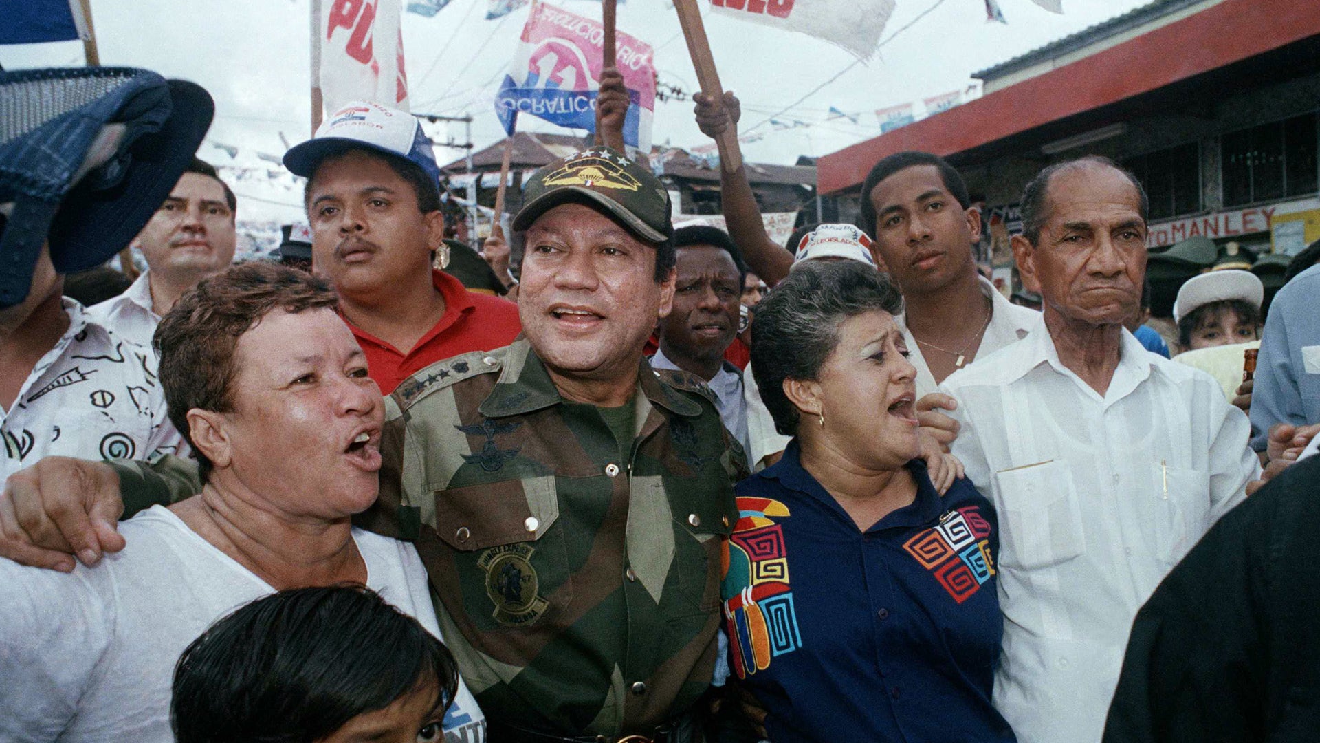 Gen. Manuel Antonio Noriega walks with supporters in the Chorrilo neighborhood on May 2, 1989.