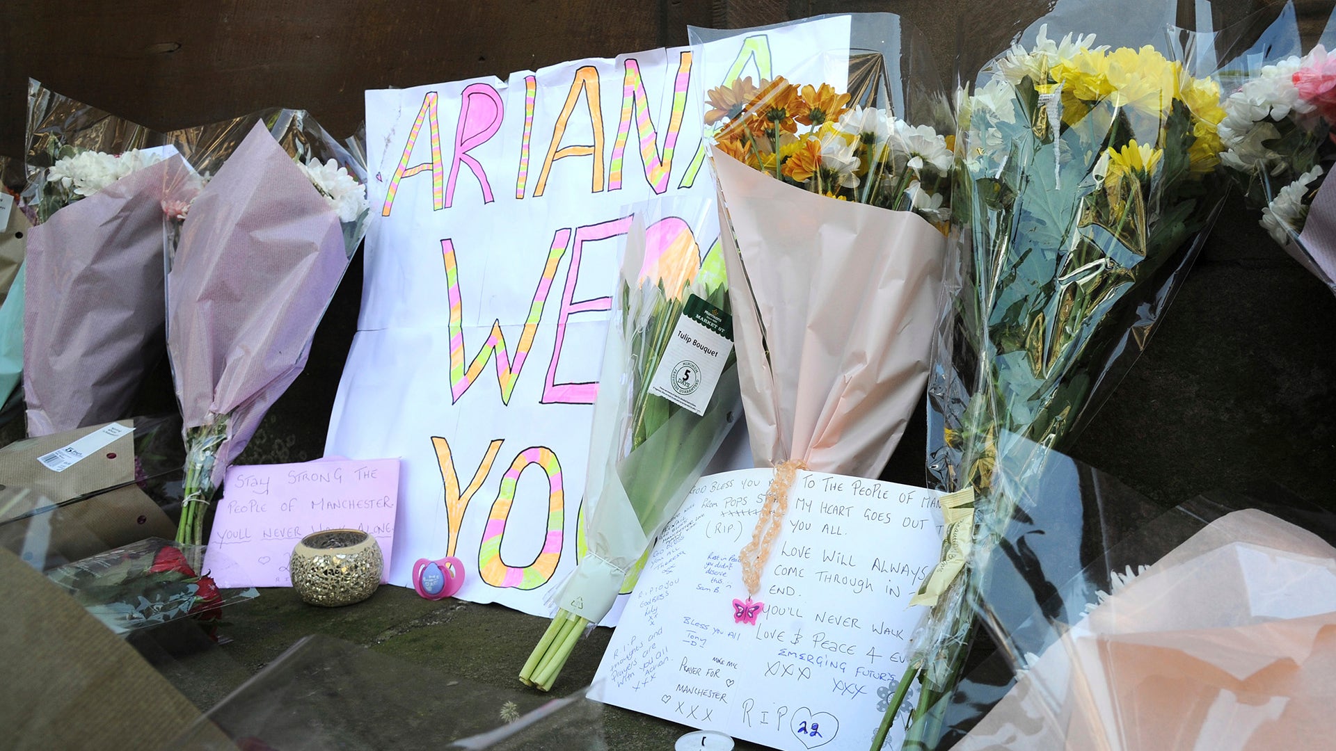 Flower at St Ann's square pay tribute to the victims of the terror attack in Manchester, England 