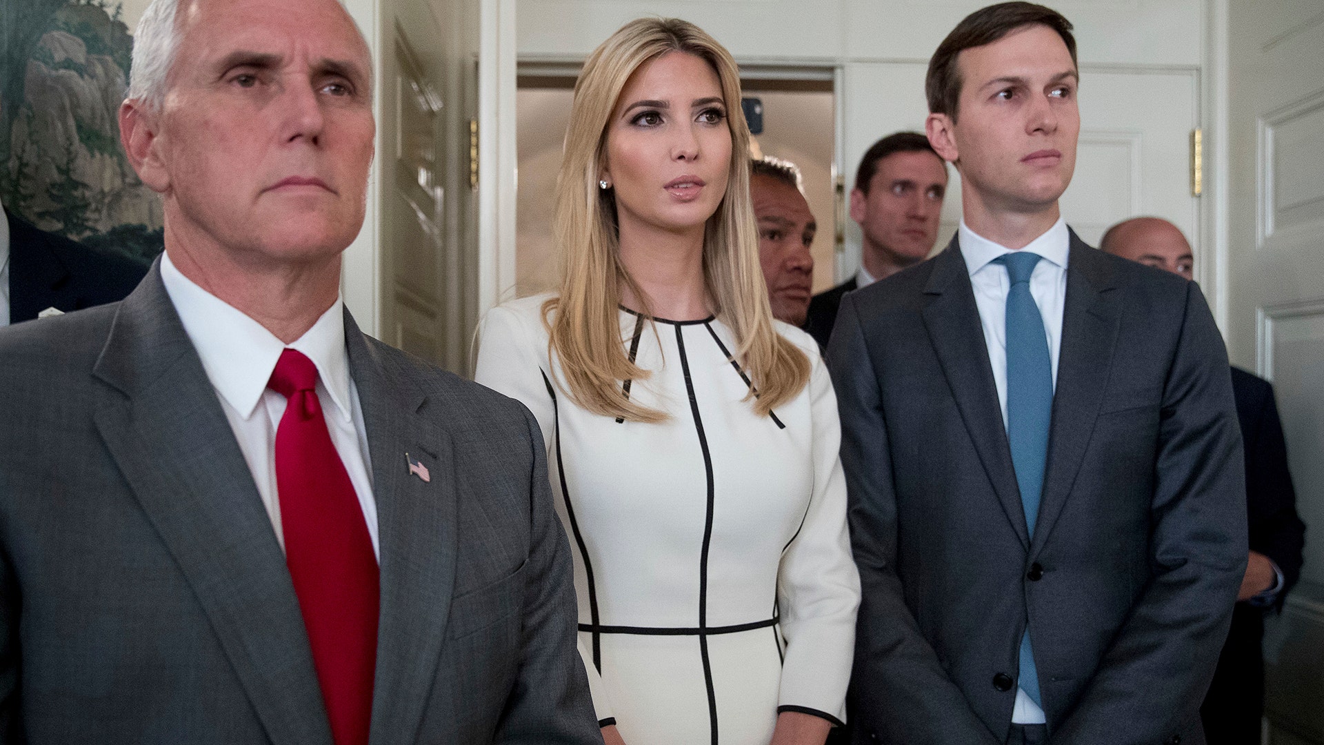 Vice President Mike Pence, Ivanka Trump and Jared Kushner listen as President Donald Trump speaks at the White House