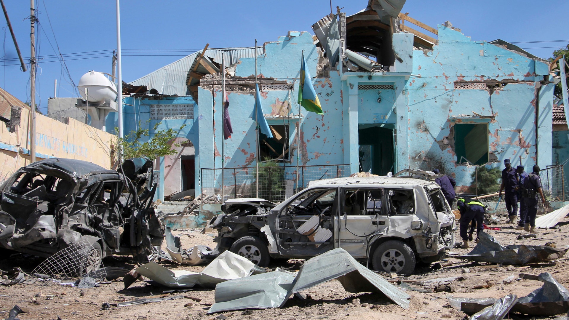 Somali security forces attend the scene of a car bomb attack in Mogadishu, Somalia 