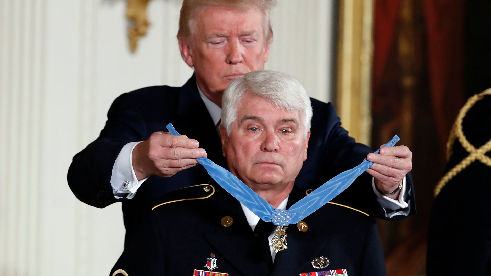 President Trump bestows the nation's highest military honor, the Medal of Honor, to retired Army medic James McCloughan
