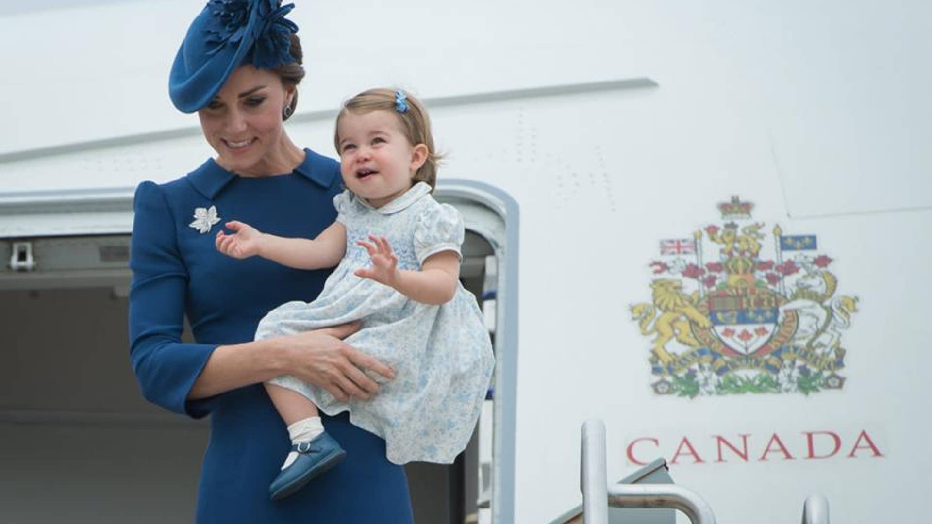 Princess Charlotte appears to be in a better mood.