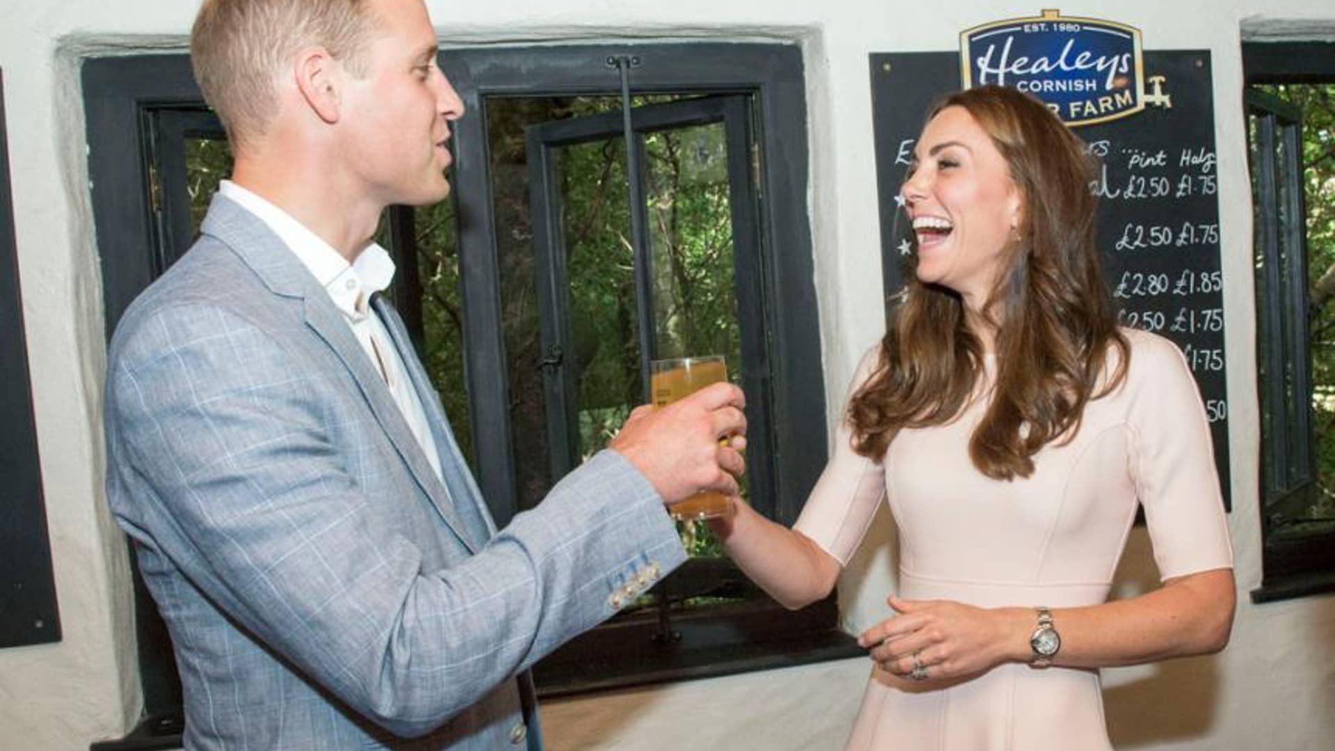 Handing Over Pint to Prince William